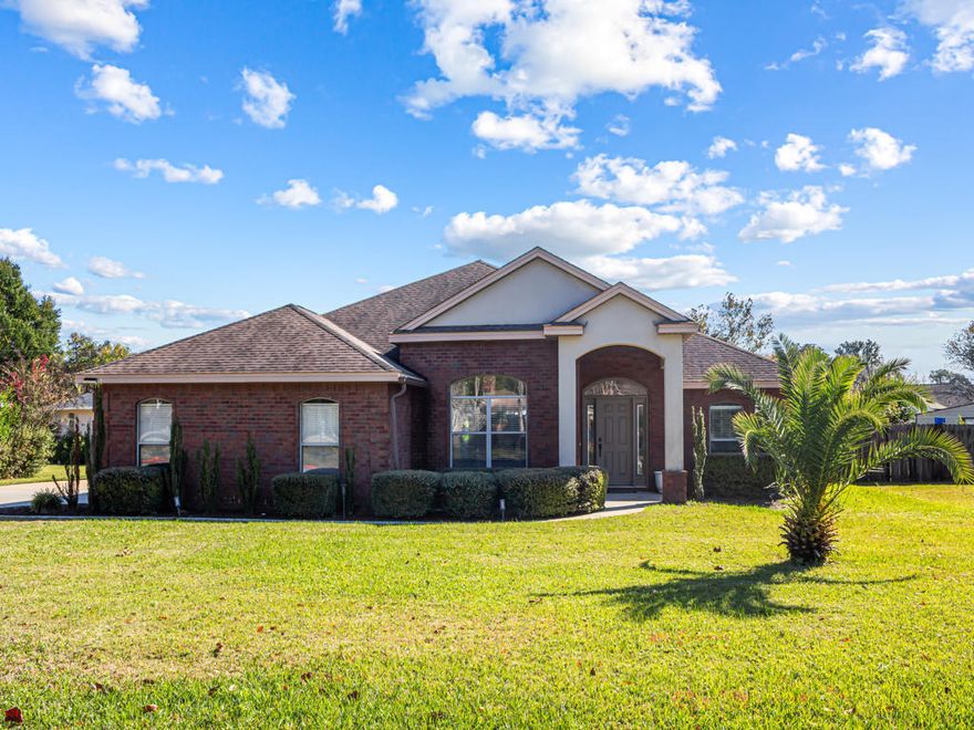 Modern, efficient, and full of upgrades--this Destin home has it all, AND there's no HOA! Step inside to an open layout with a split bedroom floorplan, tall ceilings and stylish California LVP flooring throughout. The kitchen features granite countertops and a gas range. A tankless water heater keeps the hot water flowing. Smart home touches--keyless entry, a smart thermostat, and hidden TV wiring in every bedroom and the living room--add everyday convenience.Out back, enjoy a fully fenced yard and a covered patio already prepped with a gas line for your dream outdoor kitchen or hot tub. The property also offers rare flexibility with two garages: an attached garage with EV-charging capability and a detached garage with extra storage, a 240V outlet, and its own heating and cooling.