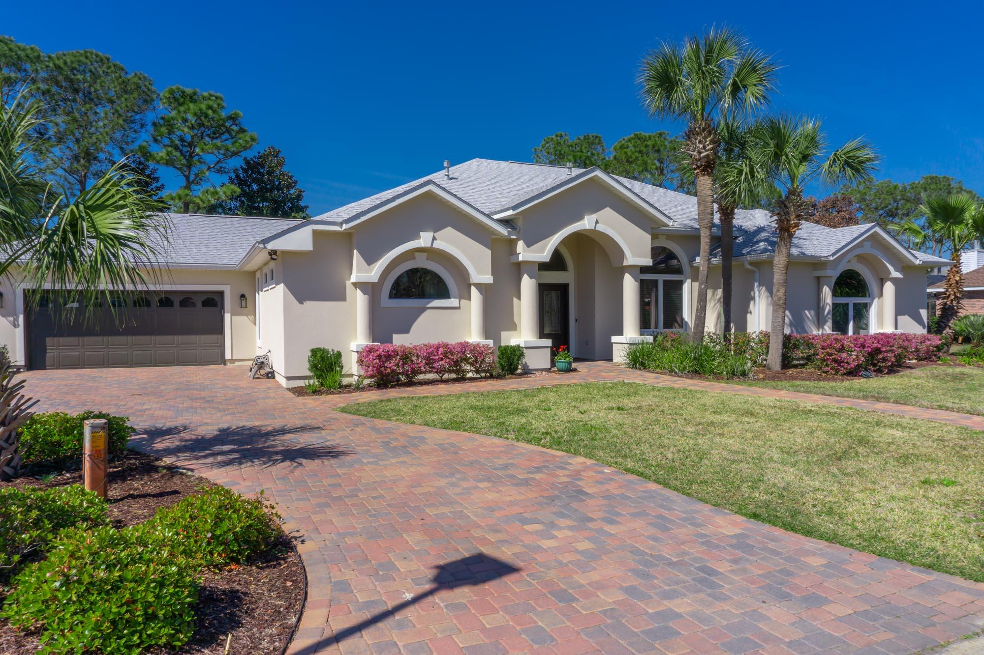 This is a must see. Your tropical oasis awaits! This 3-bedroom, one level home offers the perfect coastal lifestyle with a phenomenal lanai, screened-in pool, spa and plentiful outdoor spaces on nearly 1/2 an Acre lot, all while being surrounded by lush landscaping and a natural setting. This home features a new roof 2018, new polished Travertine floors 2018, New Fence, New Screen enclosure, pool pump and heater,, New pavers, fresh paint interior and exterior, New A/C, new blinds and shades, new inset lighting & fixtures, new baseboard & Crown Molding.