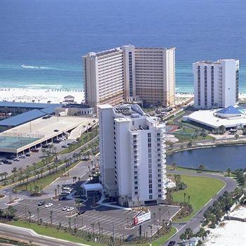 Wow! What perfection inside this 12th floor prime location with a wrap around balcony that has a 270 degree view of the Gulf, Harbor and Bay. New Sofas and carpeting in bedrooms. This beachy- themed unit it turn-key rental ready. The Lock-out 1 bedroom has a wet bar and private bath that opens the door to many possibilities. Covered parking. Rental income 2015:28,245.00 Thru Pelican Beach Management. Call me to show.