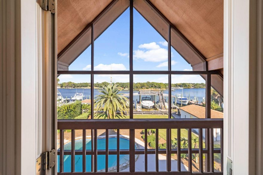 Motivated, Bring all offers!  Welcome to 710 Beach Drive, a  waterfront oasis with a fantastic investment opportunity. Situated in a highly sought-after location, this property offers not only a beautiful residence but also a steady income stream through its 5 boat slips. Currently generating $2,700/month in rental income, these slips provide a rare chance for passive income while enjoying the serene waterfront lifestyle. This stunning 3 bed, 4 bath property spans three stories, offering breathtaking, panoramic views of the Bayou. This is the absolute boater's paradise, perfectly situated on the tranquil waters of Joe's Bayou, the largest Bayou in Destin, this home offers everything you need for the ultimate water- based lifestyle. Featuring 100 feet of direct water access with 5 deep  water private boat slips that can accommodate boats up to 60 feet. Inside, you will find an expansive living area that welcomes you with its generous layout and abundant natural light. The living area flows seamlessly into the kitchen with stainless steel appliances, a large island, brand new white quartz counters and plenty of cabinet space. Soft, neutral tones and elegant finishes enhance the warmth of the room, making it a cozy retreat for any occasion. Just beyond the living space, sliding glass doors open to a charming, covered porch, extending your living area outdoors. This serene porch is perfect for providing a shaded spot to relax while taking in views of the surrounding landscape. With ample space for comfortable seating and outdoor dining, it's an ideal setting for entertaining or simply unwinding in nature's embrace. Retreat to the luxurious master suite, complete with a private balcony that overlooks both the sparkling pool and the serene waters of the bayou. Imagine starting your day with a cup of coffee while taking in the tranquil views or winding down in the evening as you watch the sunset paint the sky. This home offers two more spacious bedrooms for your guests or family to enjoy. After a day on the water, this home offers the perfect space to unwind or entertain your family and friends. The lower level of the home has an office, a spacious lounge area, a full bar and an additional kitchen. With direct access to outdoor areas, you can seamlessly extend your gatherings outside. Enjoy summer days lounging by the pool and hot tub or relax under the expansive covered patio. Recent updates include a whole house 48 kw gas generator, new roof, HVAC, new impact windows, new quartz counters, new flooring and was just painted. The boat slips are currently being rented which allows you to generate income from this beautiful waterfront home. There are also ample parking spaces for multiple vehicles. Don't miss your chance to own this incredible waterfront gem! Schedule a viewing today!