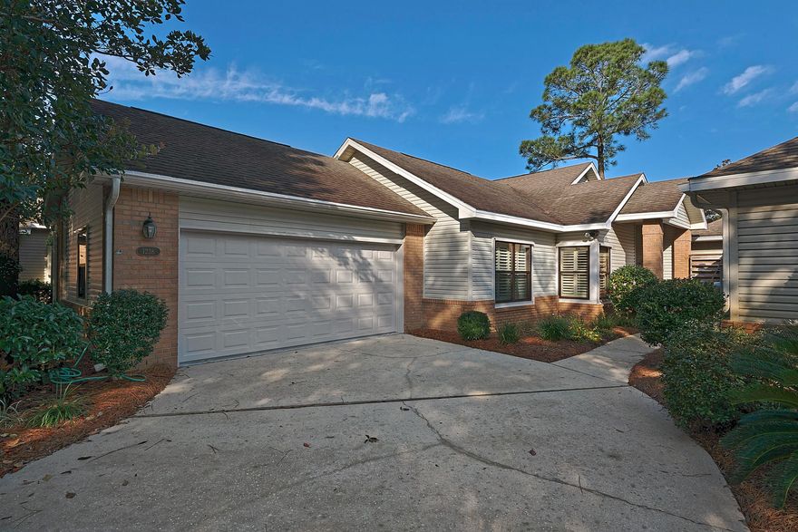 Immaculate, spacious home with a 2-car garage. Enjoy exploring the resort on your 6 passenger golf cart which is included with the home. Special features include new carpet, hardwood & tile floors, gas stove & fireplace, hurricane shutters, extra garage storage, built in bookshelves, and an enclosed Florida room which could be converted to a screened porch. The master suite is very spacious with a huge 16 foot walk-in closet and an en-suite featuring his & her sinks, linen closet, and separate garden tub and stand up shower. Spend your days relaxing in the Florida room or outdoors in your private back yard which is completely fenced in. The association takes care of maintaining the landscaping and irrigation. Deerwood is a short term rental restricted neighborhood.