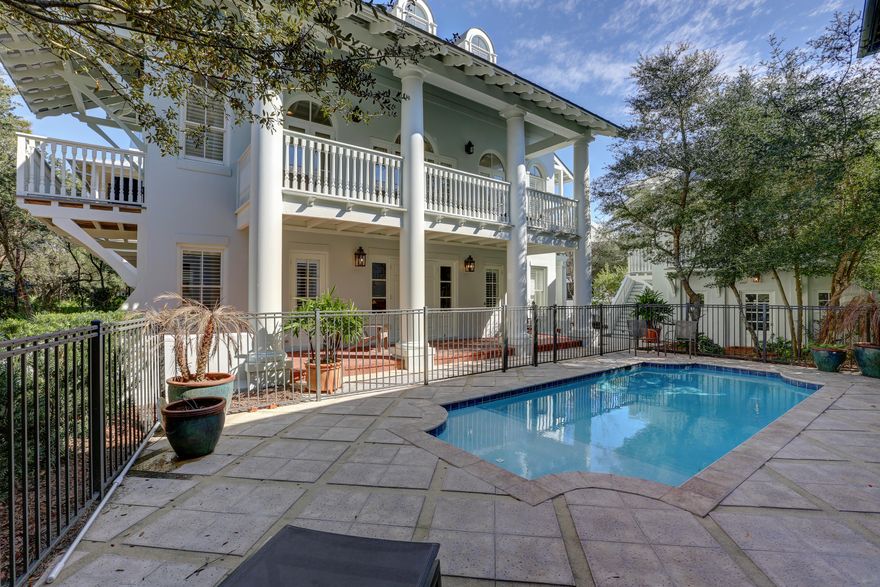Major price drop! All new living room and kitchen furnishings added in April 2019, new 3rd floor furnishing in Sept 2019. Privacy abounds in this 3 story, all stucco home & carriage house south of 30-A, in Rosemary Beach. A large, heated pool along with separate patio with fire pit and grill, provide plenty of space for outdoor enjoyment. Entering through the front, bricked & columned porch is reminiscent of New Orleans grand plantation homes. The first floor houses the large, master suite complete with recently renovated bathroom. Bunk room with 4 beds, plus another bath and laundry room, complete the first floor. Ascend the curved grand staircase to the second level living area - kitchen, dining and living. Evenings will be spent dining al fresco on the spacious second level balcony!