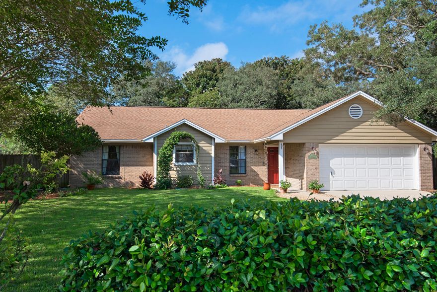 This adorable brick home is perfectly located in Destin FL, only a quarter of a mile to Joe's Bayou and offers a true coastal lifestyle. 
Just down the road from Destin Elementary with quick backroads access to 98 into Fort Walton Beach and local military installations. So close to shopping, dining, the harbor, and most importantly, the beautiful waters along the Emerald Coast!  This 3 bedroom, 2 full bath has a traditional feel with an easy flow.  The open floor plan is still cozy with lots of natural light and a wood burning fireplace.  The large backyard is home to several trees including Oaks, Magnolias and Crape Myrtles.  NEW ROOF GOING ON 10/19-10/23