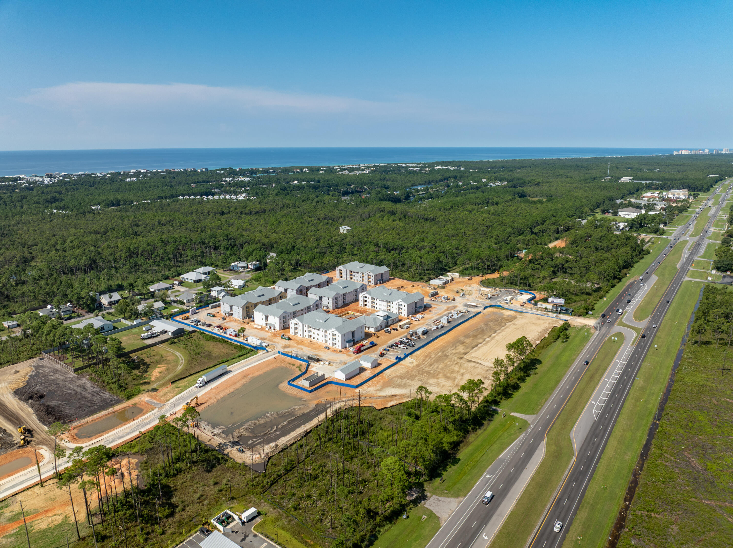 NEW LISTING! Approximately 1.46 prime acres ('Lot 3') fronting Highway 98 in Santa Rosa Beach, Florida; an exceptional corner parcel, adjacent to a future curb cut in addition to its eventual connectivity to secondary points of ingress and egress from Sugar Drive and Thompson Road, thus offering exceptional flow around the parcel. The strategic location will benefit not only from high visibility captured by the approximate 40,000 vehicles passing the site daily along Highway 98, but also the synergy with the mixed-uses surrounding the rare parcel, all economically fueled by the phenomenal growth that is occurring in Santa Rosa Beach and Scenic 30A, Florida. The superb quality of this offering is an extremely rare opportunity in the local real estate market. The pictured... illustration reveals the subject land as "Lot 3", which is entitled for potentially 15,000 square feet, accommodating commercial / retail use. The development of this parcel should be more cost-effective, as the topographic grade is favorable, and the existing entitlements should allow for a dramatic advancement in terms of timeline to gain the approvals for the development and construction of infrastructure and vertical improvements. "Pond A" indicates the stormwater retention area that will be shared by "Lot 3". Please inquire for further details.