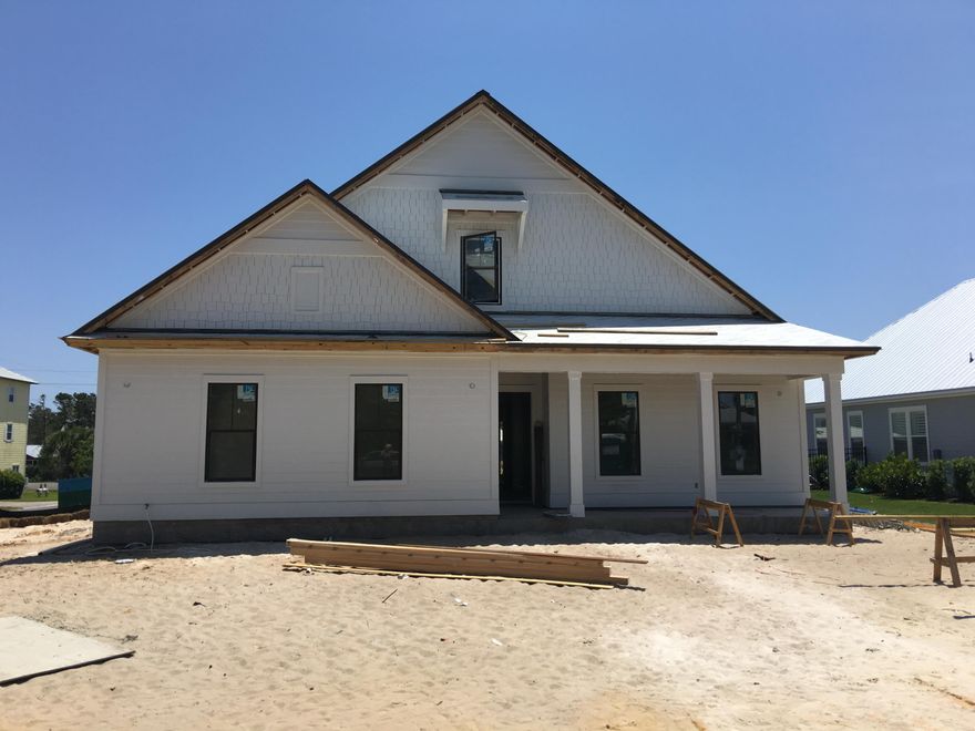 This NEW CONSTRUCTION home is convenietly located off of 30A and just blocks from the beach, shopping, dining, pristine golf courses and entertainment. This huge corner lot is 36 feet above sea level and has upgraded features that include hardwood and tile floors, granite countertops, decorative backsplash, stainless steel appliances and Large open floor plans. Spacious 2 car garage, Huge outdoor kitchen with a in ground heated pool. Huge covered porch and media Room. This home is perfect for full time/2nd home buyers as well as a premier rental property. There is No HOA fee!!