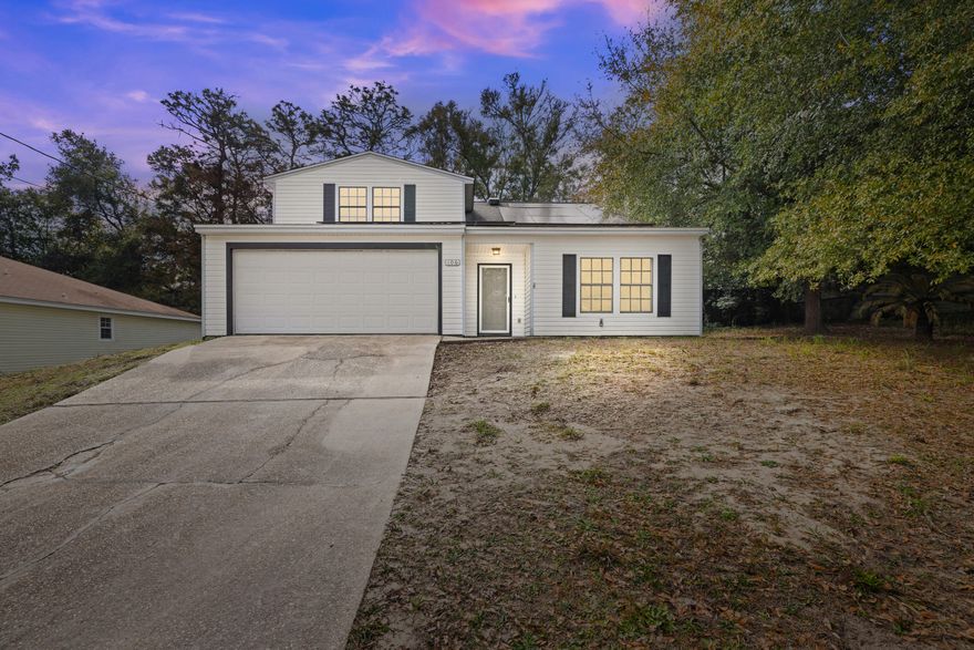 Discover this 4-bedroom, 2-bathroom home! It is a must-see, and it's ready to welcome you. As you step inside, you'll be immediately captivated by the floor-to-ceiling wood-burning fireplace--it's truly the heart of the home. The sleek luxury vinyl plank flooring flows throughout, creating a modern, inviting atmosphere. The kitchen features lots of cabinets, granite countertops, and stainless steel appliances, it's the perfect space for both cooking and entertaining.Upstairs, the custom handrail guides you to three spacious bedrooms, each with its own charm. Every corner of this home feels fresh and bright with fresh paint throughout. Outside, you'll find a fenced backyard with an open patio. With a new HVAC system, solar panels and many updates, this home is not just a placeit's an experience. Don't miss your chance to make it yours. Schedule your tour today and see for yourself why this is the one you've been waiting for!