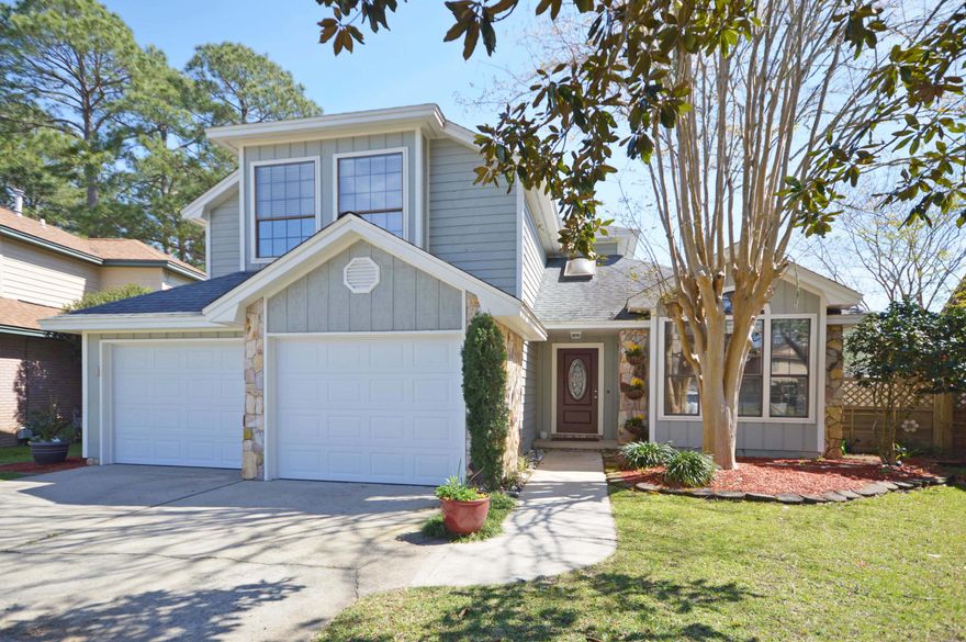 Elegant, updated 3 Bed, 2.5 Bath in Crosswind landings.The transition into the home is seamless due to the abundant natural light and lofty ceilings of the open living space. Through the French doors on your right is a charming office/ sitting room with a chair rail, wainscoting and windows overlooking a magnolia tree.In the foyer, the cathedral ceiling is crowned with a triangular window that draws you further into the tiled living area complete with gas fireplace. The siding door and windowed wall of the dining room feature 3 banks of 15 pained windows overlooking the back patio.