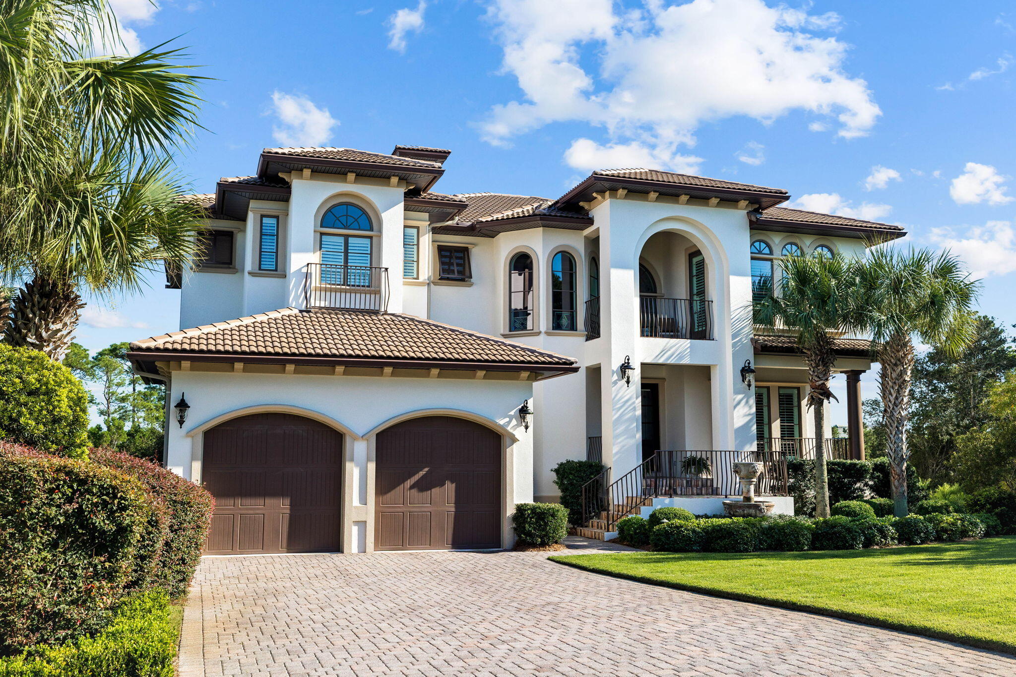 Welcome to luxury Emerald Coast resort-style living in the distinguished gated community of BellaMar at Gulf Place. Perfect for gatherings of family and friends, this spacious residence offers a sun-drenched floor plan designed to enhance both indoor and outdoor living. Deeded beach access is conveniently located directly across the street from the entrance of the community. Accommodating up to five bedrooms plus flex space with expansive balconies, this home offers gulf views and overlooks a private pool and spa with tropical landscaping. The grand two-story living room features a coffered ceiling and a gas or wood-burning fireplace, custom lighted built-ins throughout, and a 3-floor elevator providing accessibility. The oversized two-car garage includes a separate golf cart garage and can easily accommodate a boat trailer, recreational vehicles and/or a car lift for car enthusiasts. Residents enjoy convenient walking and biking trails and is close to award-winning dining and the walkable shops and boutiques at Gulf Place, including The Vue, where membership provides waterfront dining and exclusive beach chair services. Don't miss the opportunity to make this exceptional property at 188 Sea Winds Drive your own. Schedule your private showing today!