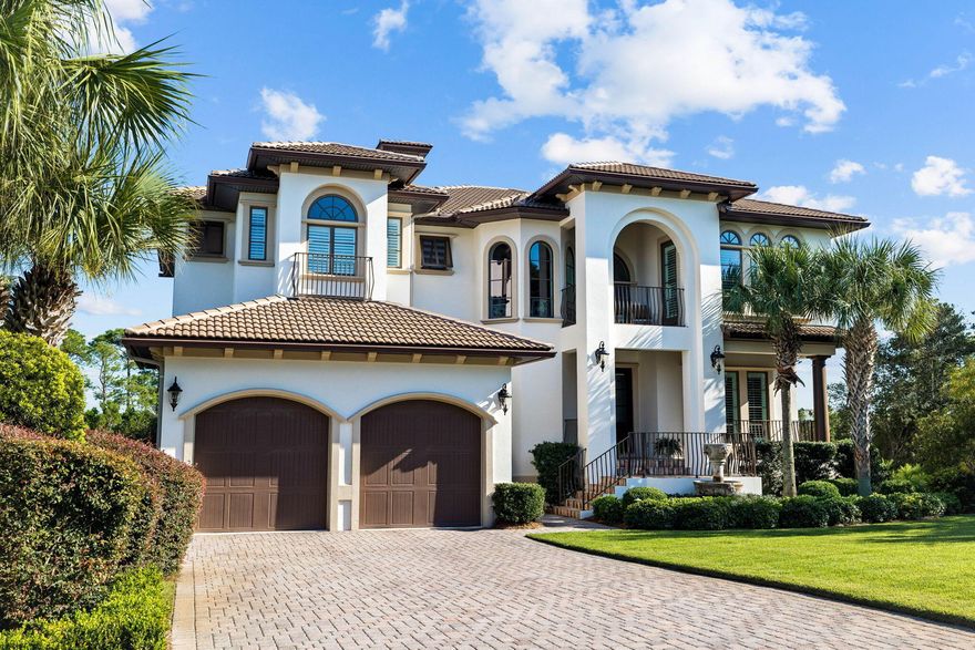 Welcome to luxury Emerald Coast resort-style living in the distinguished gated community of BellaMar at Gulf Place. Perfect for gatherings of family and friends, this spacious residence offers a sun-drenched floor plan designed to enhance both indoor and outdoor living. Deeded beach access is conveniently located directly across the street from the entrance of the community. Accommodating up to five bedrooms plus flex space with expansive balconies, this home offers gulf views and overlooks a private pool and spa with tropical landscaping. The grand two-story living room features a coffered ceiling and a gas or wood-burning fireplace, custom lighted built-ins throughout, and a 3-floor elevator providing accessibility. The oversized two-car garage includes a separate golf cart garage and can easily accommodate a boat trailer, recreational vehicles and/or a car lift for car enthusiasts. Residents enjoy convenient walking and biking trails and is close to award-winning dining and the walkable shops and boutiques at Gulf Place, including The Vue, where membership provides waterfront dining and exclusive beach chair services. Don't miss the opportunity to make this exceptional property at 188 Sea Winds Drive your own. Schedule your private showing today!