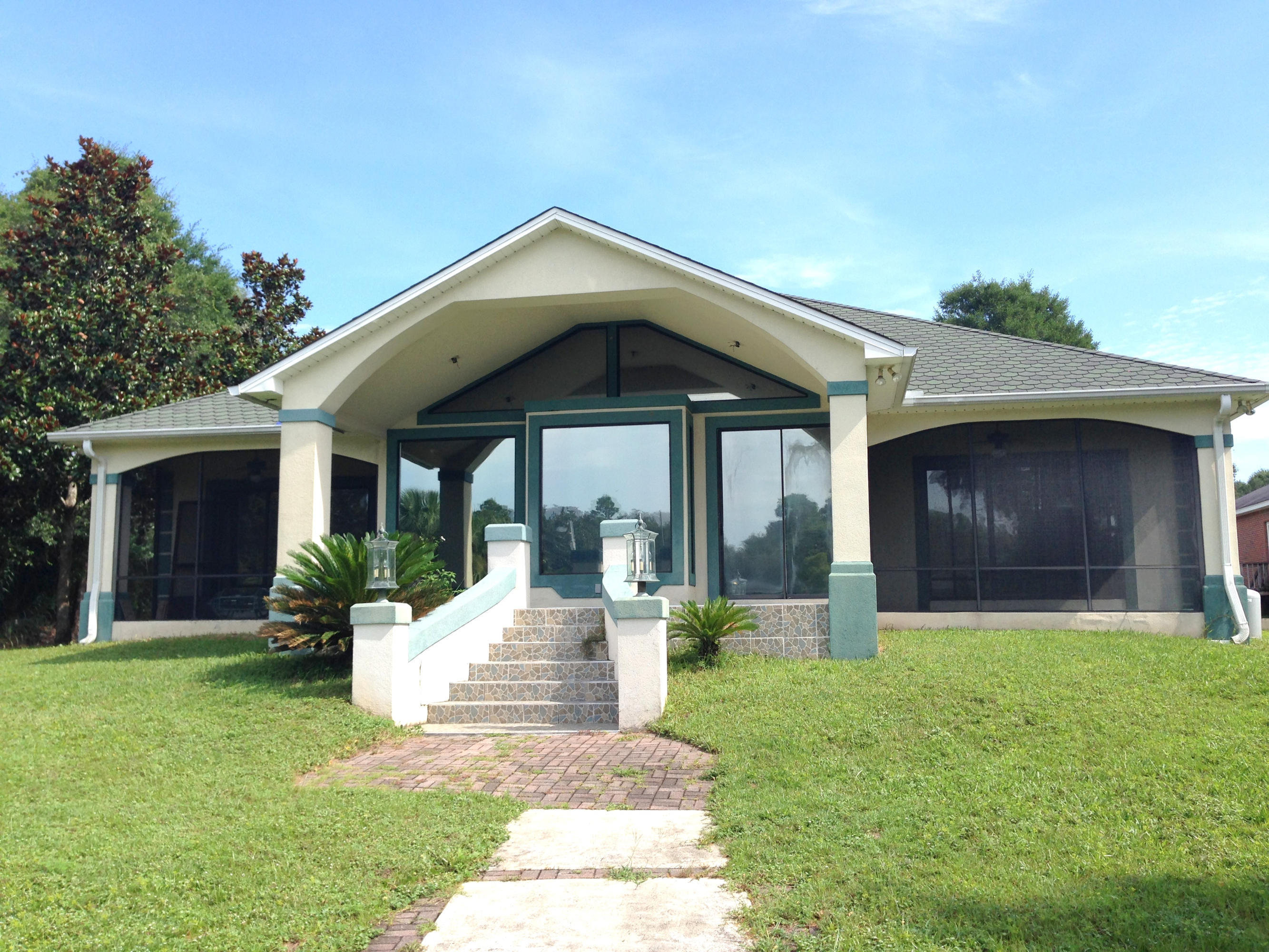Boaters paradise! Located on the deep and protected water of Sarah Anne Bayou and Rocky Bayou...Awesome waterfront home features vaulted and cathedral ceilings, interior columns, tile and wood flooring, master bath whirlpool, walk-in closets and private baths for each bedroom...Lots of glass offers serene and beautiful views of the Bayou...Home is complete with dock and boat slip!(Buyer to verify lot and room dimensions and any other information that buyer deems important.)