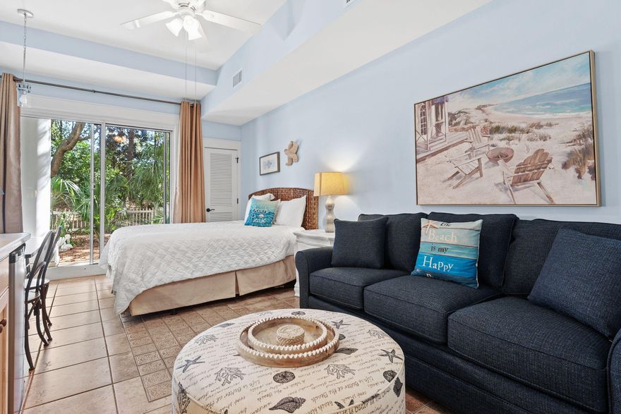 Ground floor studio in Pilot House at Sandestin Golf & Beach Resort(r)--a  resort on the Emerald Coast with golf, beaches, a marina & more. Just steps from The Village of Baytowne Wharf, a charming pedestrian village with dining, shopping, nightlife & year-round events. This studio features tile flooring, a kitchenette & walk-out access to a private fenced green space--perfect for your 1 approved furbaby (owners only). Enjoy the amenity terrace with pool, spas, fitness room, grills, the covered parking & access to the private Founder's Club room overlooking the Events Plaza.  Ideal as a personal retreat or income-producing property--don't miss this opportunity.