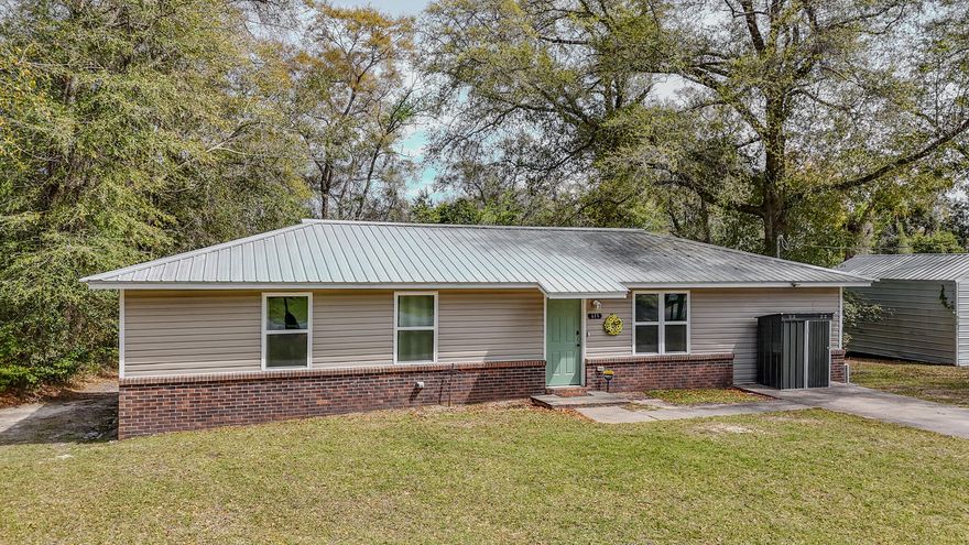Fully renovated and move-in ready, this 4 bed/2 bath home sits in downtown Chipley but still feels tucked away, with woods behind the property giving it a quieter, more private setting. At 1320SF, the layout is efficient and the fourth bedroom is a great find at this size and price point. New LVP flooring runs throughout, paired with fresh paint, updated lighting, and an all new kitchen featuring new cabinets, quartz countertops and stainless appliances. Both bathrooms have been redone with new fixtures and tub/shower inserts. The big-ticket items are solid too: metal roof, HVAC, and water heater are all just 4 years old, which means no deferred maintenance. The oversized utility room is a standout, with lots of space for laundry + pantry or storage use. Qualifies for all financing types!