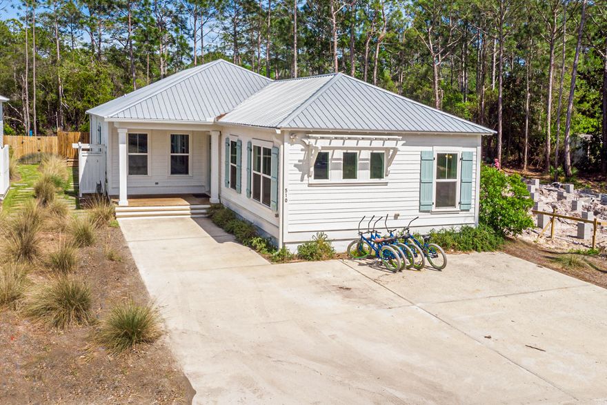 The ultimate one story 6 bedroom and 4.5 bath beach house located in Seagrove just off 30A. The San Juan Beach access is just a short .55 miles at end of the road   The home features 10 foot ceilings throughout with 2 master suites with coastal decor making the ideal house for large families or groups as it easily accommodates 16.  The open kitchen flows into sitting area leading to an outdoor oasis.  The private back yard deck overlooks forest and boasts a heated dipping pool, fire pit, grill and plenty of space to spread out.  This home was built in 2018 and has had 3 solid years of rental history.  The location, layout, privacy makes this house wonderful for full time living, short term rental or true second home ownership.  This neighborhood is a great mix of all three property owners.