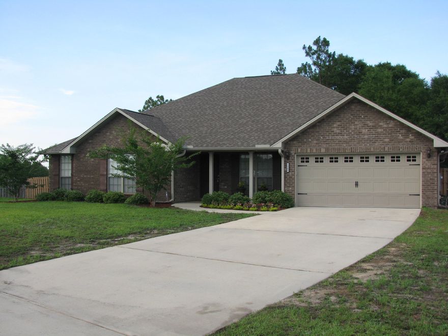 You have got to see this STUNNING 2820 Sq Ft all brick MOVE-IN READY home! Located in the convenient and centrally located subdivision of Lee Farms which allows quick access to 7th Special Forces, Duke Field, Hurlburt and Eglin Air Force Bases. This 5 bedroom, 3 bath home sits on a massive .5 acre flat and level lot enclosed by a privacy fence with plenty of space for children and pets to play. This is the largest lot for sale in this subdivision. The first floor of this beautiful home consists of exotic tigerwood engineered wood floors in the foyer, living room, dining room and breakfast area with porcelain tile in all wet areas. Nine foot ceilings featuring crown molding throughout the dining, living, breakfast, and kitchen areas provide for a nice airy feel.See More
