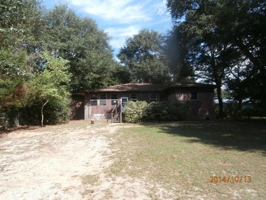 Lots of Potential in this spacious home situated on large lot... Large kitchen with breakfast bar, living room with fireplace & wet bar. All brick home with fenced lot. Don't miss out on all the possibilities. This property is eligible under the Freddie Mac First Look Initiative through 11.16.2014