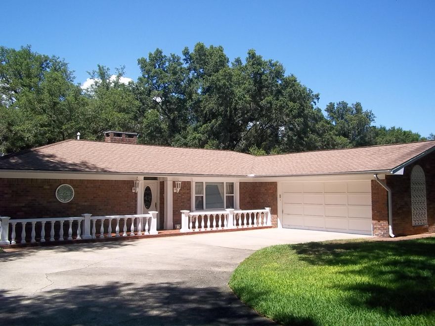HUGE price reduction! Convenience and character perfectly describe this updated 3 bedroom 3 full bath home located across the street from beach access on Choctawhatchee Bay. With over 2200 square feet of living space, the home includes a large formal carpeted living and dining area which opens through French doors into your lovely brick sun room. The tiled family room features generous built in book and display shelves and a gas fireplace with a custom made glass screen. The third bedroom is used as an office with large desk area and work space. The master bedroom has a full wall of custom made closet and storage space as well as a walk in closet in master bath. The master bath features a beautiful antique vanity and bold brass fixtures in the deep jetted tub and custom made shower.