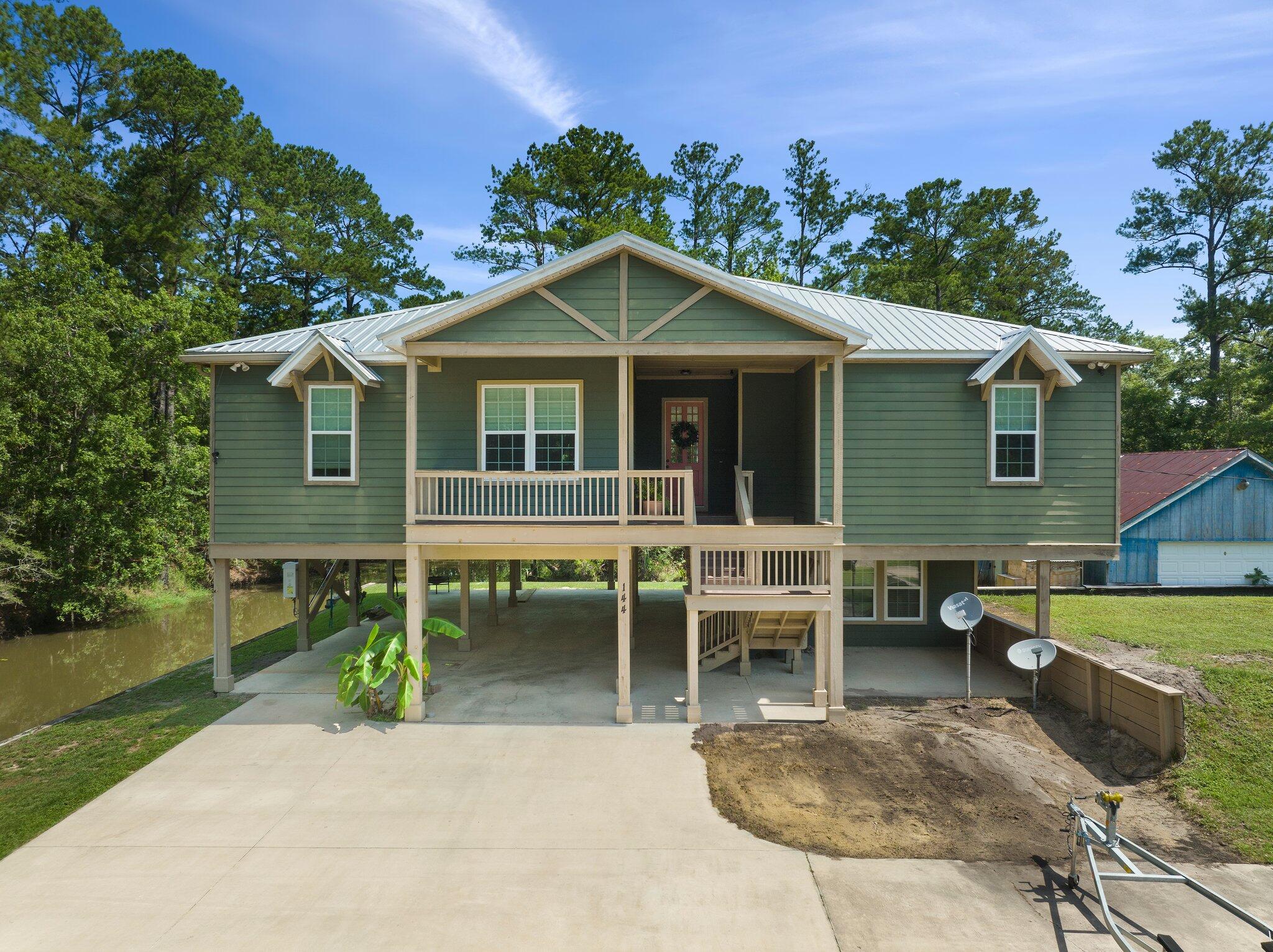 Your private oasis awaits... Relaxation, adventure, and abundant wildlife reside here- yes, you can have it all! Situated on the corner of the canal with 266' of waterfront, this home is located right in the heart of the Choctawhatchee River with easy access to the Choctawhatchee Bay and the fresh water springs to the North. This custom built home includes all the features you want: split floor plan, elevator, screened in summer kitchen, private deep well, Generac generator, hardwired security system, private boat dock, and a plethora of cabinets and kitchen storage including hall pantry.This home is a must see!Buyer to verify all information and measurements deemed important.