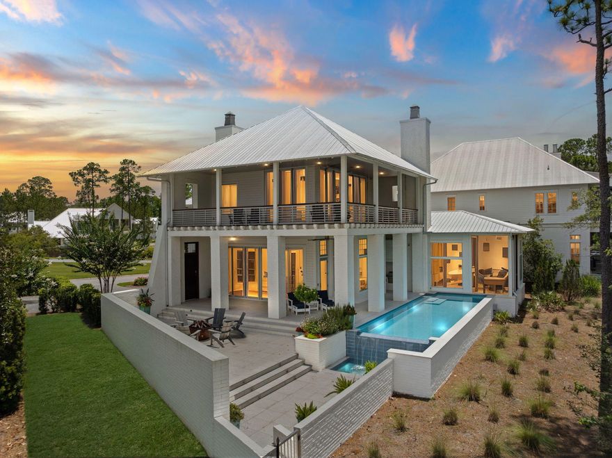 Introducing 15 Parish, a bold and sophisticated contemporary estate set along the protected shoreline of Choctawhatchee Bay in the prestigious gated community of Churchill Oaks. Designed with clean architectural lines, expansive glass, and open living spaces, this custom residence pairs modern luxury with timeless natural beauty.Set on one of the most coveted homesites in the community, 15 Parish enjoys uninterrupted views of the bay and direct adjacency to a conservation preserve, ensuring permanent privacy, open space, and sweeping vistas that will never be built on.The home features 4 bedrooms, 4.5 bathrooms, plus a bunk room, all crafted with thoughtful detail and livable elegance... The first-floor primary suite offers tranquil water views, outdoor access, and a spa-like bath retreat. Main living areas connect effortlessly to the outdoors, opening to expansive covered terraces that capture both sunrise and sunset light.

A standout feature is the private pool overlooking the preserve and the bay, offering a serene and elevated backdrop that transforms everyday living into a resort-style experience. Whether swimming, lounging, or dining alfresco, the outdoor living space is both private and breathtaking.

The detached carriage house includes a full kitchen and laundry, providing flexibility for guests or multi-generational living. A 50-foot private boat slip with lift is also included, placing open water access just steps from your front door.

Located within Churchill Oaks, South Walton's premier bayfront community, the home is surrounded by over 40 acres of preserved natural landscape, including trails, lakes, and centuries-old live oaks. With low-density planning, architectural continuity, and a focus on coastal elegance, Churchill Oaks offers a sense of peace and permanence rarely found on the Emerald Coast.

At the heart of the neighborhood is an 8,000-square-foot bayfront clubhouse, featuring three pools, fitness facilities, a catering kitchen, and a full-service marina. These amenities complement the relaxed luxury that defines the Churchill Oaks lifestyle.

15 Parish is more than a home. It is a modern coastal sanctuary, blending contemporary design with protected natural beauty and refined community amenities in one of Northwest Florida's most sought-after waterfront settings.