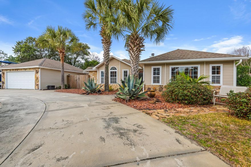 More than MOVE IN READY! This home has so many awesome extra features that you will never want to leave! This RENOVATED home has all the modern qualities and amenities you want. The incredible large living area has space for family and friends. Continue on to a great kitchen area which is open and spacious. The dining area has a pull up bar and eat in area with cozy fireplace. Two walkout Patios! You must see the special touches of PLANTATION SHUTTERS on every window. WOW! Do you love shiplap? This house has it! Crown molding? Check. No carpet in this home, beautiful ceramic tile throughout. The back yard, !!! - a beautiful POOL area, including a Gazebo, firepit and workshop w/power. Split floor plan. Large covered porch w/grilling area. Great location to beach & Hurlburt Field