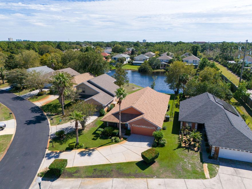 Tucked right in the heart of Destin in the extremely Desirable Emerald Lakes Subdivision is this exquisite 3 bedroom, 2 bath located on a beautiful lake. It has been Fully renovated with a new addition including an ensuite office and a small Florida room, Updated Kitchen with Beautiful Granite countertops, Remodeled bathrooms with the master including large walk-in shower, Hard wood tile flooring throughout the main living space with durable and beautiful cork flooring in the bedrooms, State of the art Water softening system, new roof in 2021, HVAC replaced in 2019.  There are Too many upgrades to list, every detail on this home has been thought through and planned for so that you don't have to. Just see it and let it be the easiest best decision you've ever made.