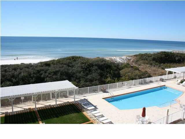 Welcome to Watercolor's premier luxury Gulf front living with this four bedroom, four bath two-story condominium located on the third and fourth floor of the building. When entering this spacious home, you are greeted with an expansive view of the Gulf of Mexico. There is hardwood flooring throughout the living areas and bedrooms, and tile in the bathrooms. The kitchen is top of the line with granite countertops, stainless steel appliances by GE, custom cabinetry and views of the Gulf. The first floor living and dining area open to a deep balcony with east to west views of the white sand and blue water. One of the two generous sized bedrooms on the 1st floor has views of Watercolor town center, the other a gulf view. The main master on the 2nd floor has a private balcony and complete vi