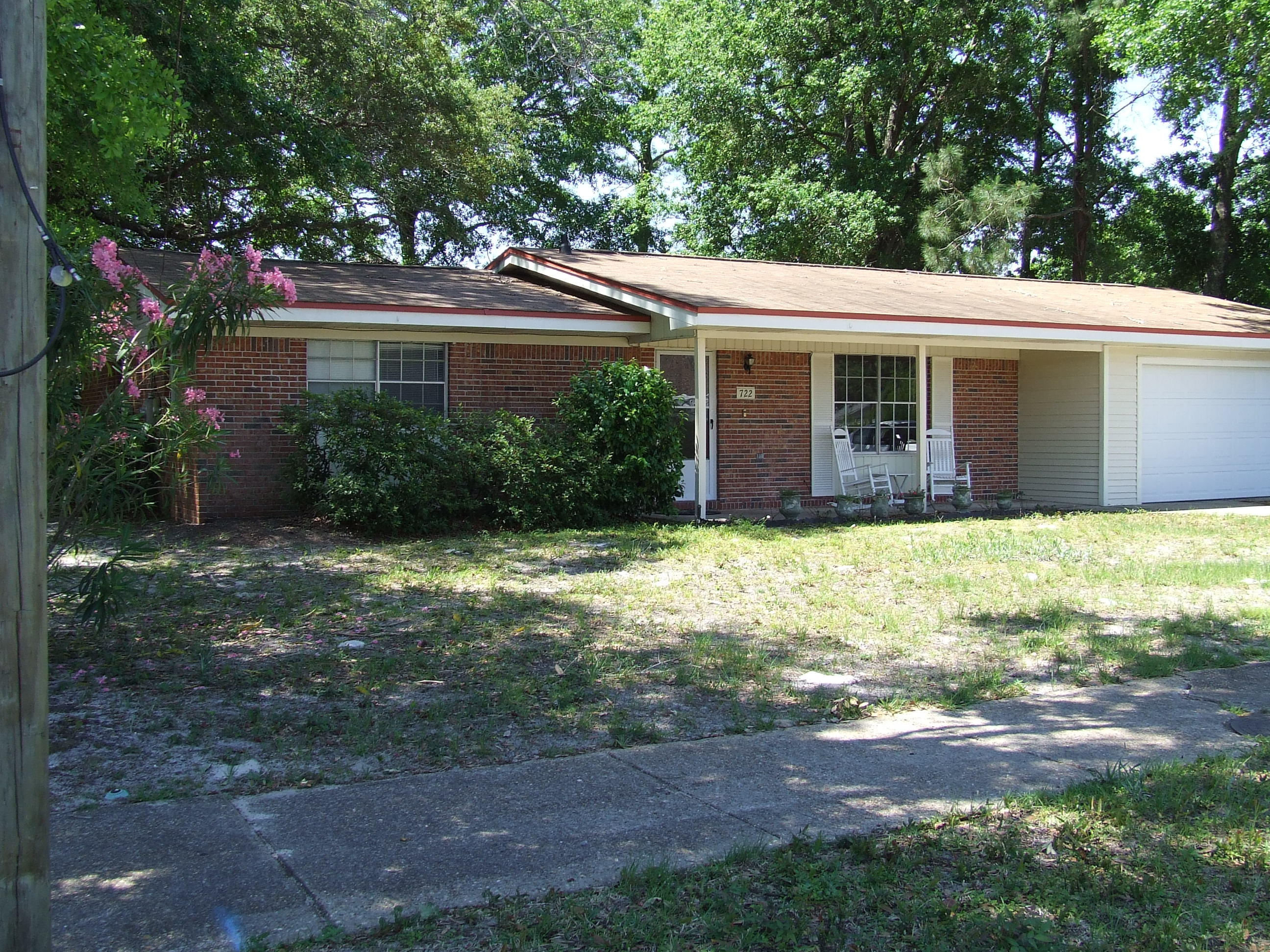 Beautiful, Move in ready home close to Fort Walton Beach High school!Great open floor plan! Tile floors throughout the home. Aluminum wiring updated in 2016. Home features 3 bedrooms, 2 bathrooms plus a bonus room/office. It has a large inside laundry room and a nice enclosed Florida room! All light fixtures have been updated. Home was recently painted, and a brand new garage door installed. Back yard is completely fenced.