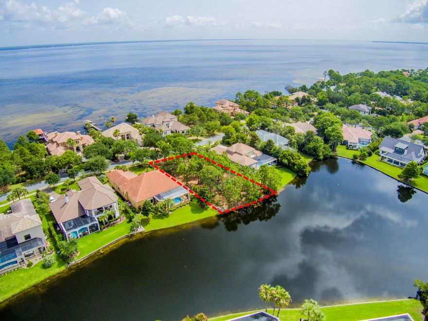 Beautiful lakefront lot in the gated neighborhood of Regatta Bay Golf & Yacht Club on the prestigious address of Captains Circle! This large lot is approximately 90 x 170 and is across the street from the bay and multi million dollar homes! This homesite has just been freshly bush hogged and you can see the beautiful waterfront setting! Large enough to accommodate your new luxury home! Regatta Bay is known for its amazing 18 hole golf course, Golf Academy, LuLu's Restaurant, The Grill that is open at the Regatta Bay clubhouse that serves breakfast lunch and dinner, Rubio Tennis Center, access to the Yacht Club pool and Legendary Boat Club overlooking the bay, private library, golf bag storage, locker room facilities and Destin Middle school is on property! Golf cart to Destin Commons!