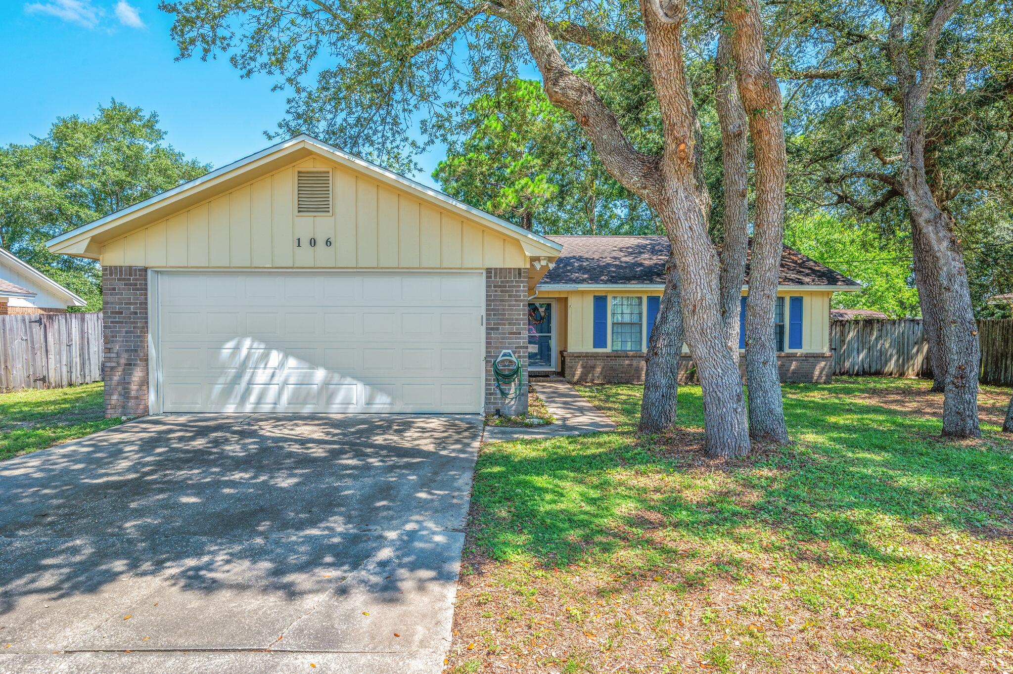 Welcome to this charming 3-bedroom, 2-bath home in South Crestview, offering convenient access to the bases, beautiful beaches, and nearby shopping centers. This home features a spacious two-car garage and a bright, cheery kitchen with a cozy breakfast nook perfect for morning meals. The living room boasts tall ceilings with striking wooden beams and a brick fireplace, adding warmth and character throughout. Three comfortable bedrooms and two full bathrooms provide plenty of space for family and guests, while the fenced backyard offers privacy and room for outdoor activities. Updates include a 2015 roof, 2016 HVAC, and a 2021 water heater, making this home move-in ready and full of charm.
