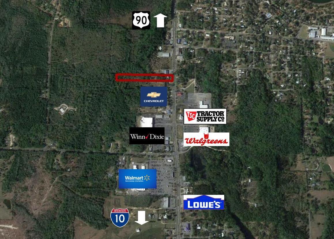 Great commercial property located on 3.28 acres, 1 mile north of I-10. On the property sits a 2527 Sq Ft historic home that was built in 1946. This home would make a great restaurant, Antique Store, Bed & Breakfast, or Professional office location. Triangle Chevrolet is on the 13 acres to south side of this parcel and Tractor Supply across on east side. The Winn Dixie Shopping Center and Wal-Mart Shopping Center are just a couple of blocks south. Owner Financing with 20% down 6% interest with 5 year balloon.
