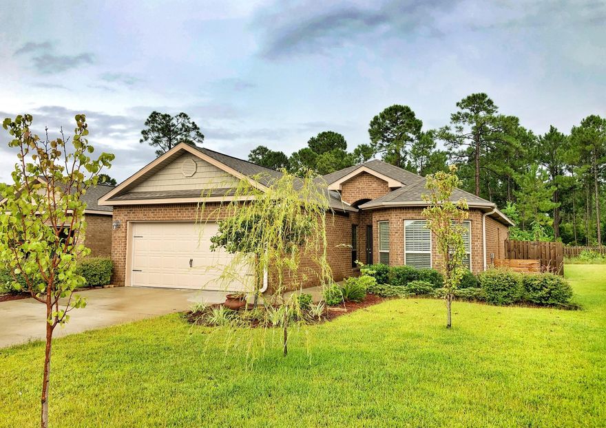 SELLER IS READY FOR AN OFFER! THIS HOME HAS BEEN UPGRADED WITH LAMINATE HARDWOODS, FENCED YARD WITH MINI STORAGE OR PLAYHOUSE, A WELL INSTALLED FOR WATERING YOUR GARDEN OR KEEPING THE FLOWERS BLOOMING! UPGRADED APPLIANCES AND WASHER AND DRYER + CHEST FREEZER INCLUDED. NO CARPET AT ALL IN THIS HOME SO IT'S PERFECT FOR YOUR PETS AND HUGE YARD FOR FAMILY WITH PAVERED PERGOLA AND COVERED PATIO! WHERE ELSE CAN YOU FIND BEACH, BAY, AND POOL WITH PLAYGROUND, LAKES...LOW ASSOC FEE OF $50 A MO..FOR THIS PRICE??