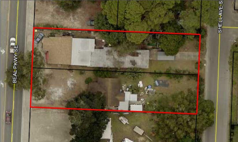 ZONE: CG Commercial... This sale combines the two lots at 69 and 71 Beal Pkwy. Property runs approximately 95 feet on Beal is approximately 200 feet deep and has approximately 95 feet on Shell Ave. 69 Beal has an old triplex and 71 has a house. All with tenants renting from Month to Month. No value has been given for the structures. Gross monthly rentals for the 4 units is $1,880. ALSO listed in Commercial for Sale, MLS #872529