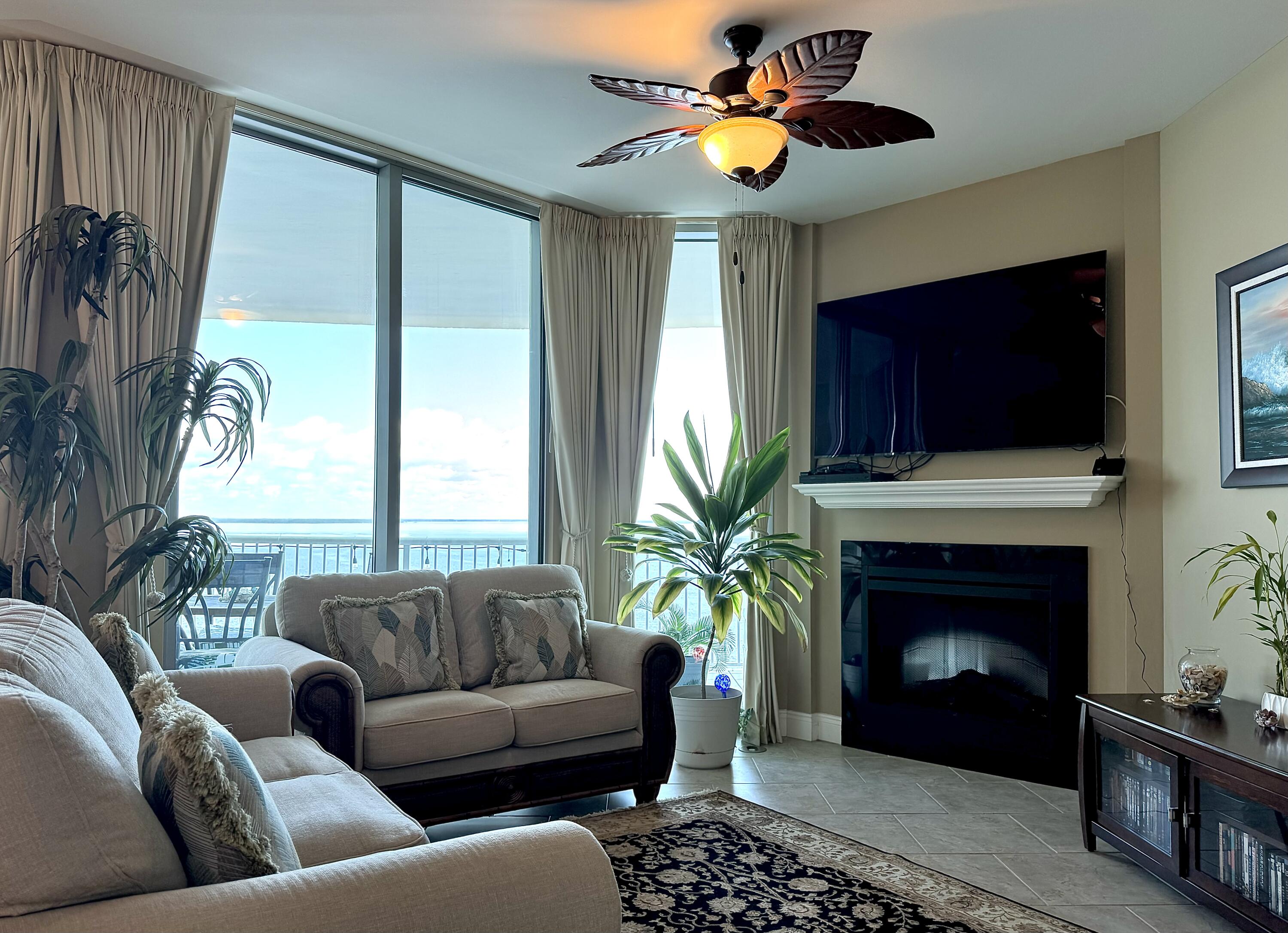 No upcoming special assessments or HOA increases, with a clean structural report for added confidence. This exceptional residence offers breathtaking, floor-to-ceiling views of St. Andrews Bay from every room, creating a seamless connection to the waterfront. Begin your mornings with stunning sunrises reflecting off the water or enjoy uninterrupted rest with custom blackout drapes. The well-appointed kitchen features granite countertops, a breakfast bar, stainless steel appliances, and a pantry, combining elegance with functionality. Acacia natural ceramic tile flooring enhances the twin master suites, offering both durability and coastal charm. Each suite includes a spacious walk-in closet, a double-sink vanity, and a luxurious tub for ultimate relaxation. The expansive balcony, complete with an outdoor grill, provides an inviting space to unwind while taking in the dynamic scenery of St. Andrews Bay, from passing boats to vibrant marine life. Experience the perfect blend of comfort, sophistication, and breathtaking views in this premier waterfront residence. New appliances include a 2024 50 gallon water heater, 2024 garbage disposal and a 2022 3.5 ton heat and air conditioner with a 10 year warranty on parts and compressor. For additional storage, the owners closet is conveniently located directly across from the unit. Marina Landing amenities include a bay front pool, hot tub, health/fitness center, mail area, dog park, and a private pier. Marina Landing is conveniently located between the attractions of Panama City Beach and the quieter offerings of Panama City where locals go.