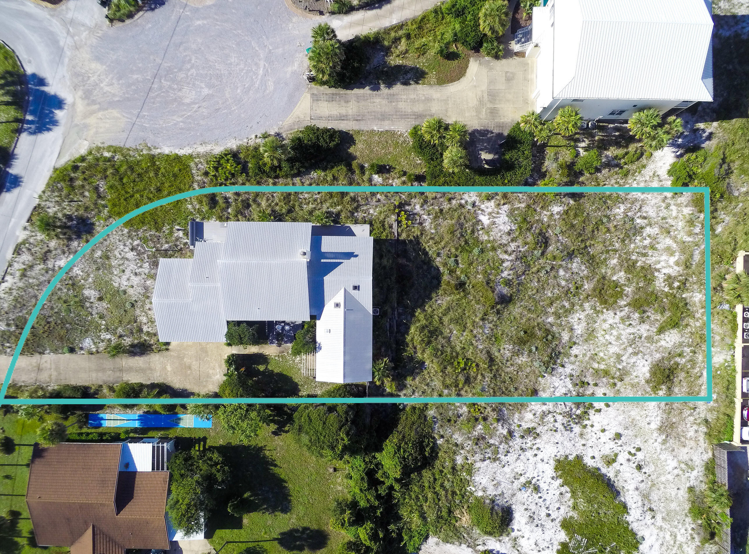Don't miss this opportunity to live 2nd Tier from the beach in the highly sought after neighborhood of Gulf Pines in Miramar Beach. You will live just steps from the beach and azure blue waters of the Gulf of Mexico. Sit on your terrace and feel the gulf breeze and hear the waves. You will live on .64 acres rising approximately 17.5 feet above sea level on one of the most desirable lots in the neighborhood. Since the home was constructed in 1990, no rising waters from storms have affected the home. If you are dreaming of building the beach home of your heart's desires, here is your opportunity to design capturing views and to construct using the latest building technology and codes. Ready to play now...make this 3-bedroom 2.5 bath home with 2 car garage and entry courtyard yours. Add your brushstrokes with new furnishings, paint and or add some improvements with a remodel. There's plenty of room for a swimming pool and guest house. Few neighborhoods as special as Gulf Pines exist along the Emerald Coast. Lots are graciously sized, and the community is ideal going for walks and meeting neighbors. Gulf Pines touts approximately 1,300 feet of beach as the private gulf front homes each sit on approximately 100 feet of beach as does the common area beach pavilion. In addition, Lake Morrison in Gulf Pines offers common access to the lake for fishing, stand-up paddle boarding and kayaking. The beach access via a board walk to the neighborhood pavilion is private. Golf carts are one of the main modes of transportation in the community and there is ample parking at the beach for golf carts and vehicles. Live and play minutes from the area's finest golfing, tennis, dining and shopping. Explore nearby Silver Sands Premium Designer Outlet, Grand Boulevard, Market Shops at Sandestin and AMC Classic Boulevard 10. On Saturday mornings after a walk on the beach, head to the Farmer's Market at Grand Boulevard for fresh fruits, vegetables and local honey, or breakfast at the Market Shops at Sandestin. The best part about living in Gulf Pines is the laid-back beach atmosphere and the beautiful surroundings. Come and discover the beauty of living in Gulf Pines. See you at the beach!