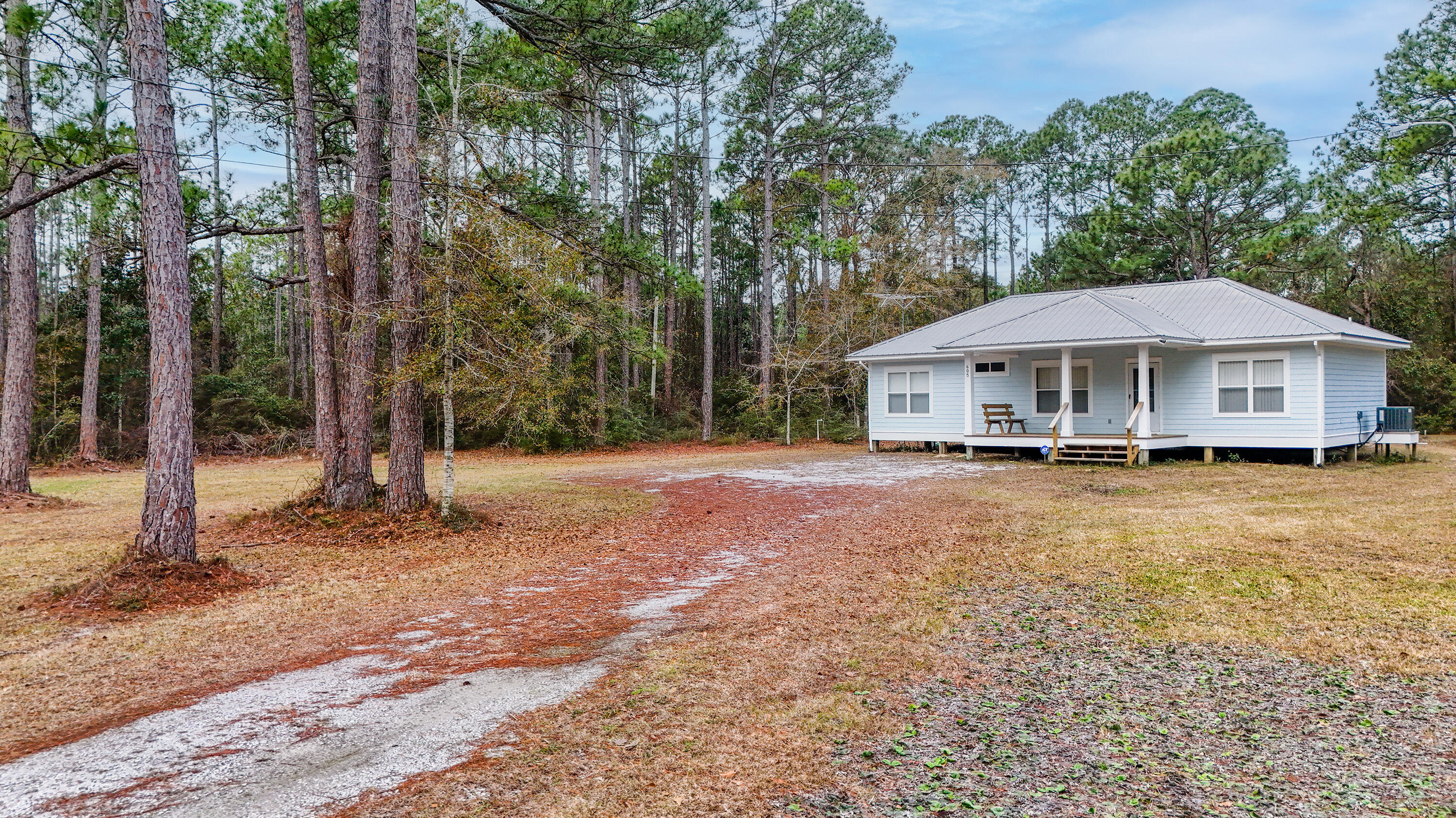 18 residential lots and a 3BR/2BA home on 3.7 acres in beautiful South Walton. Location is in rapidly developing South Walton with paved road frontage on Indian Woman Road.