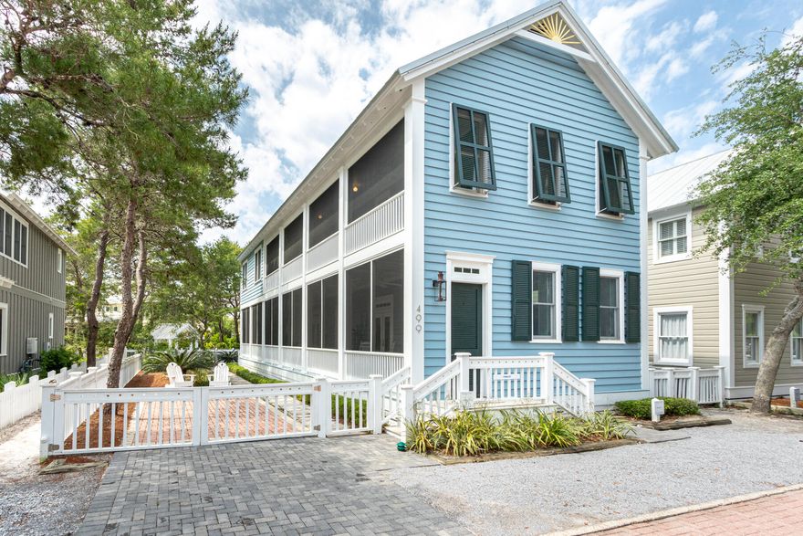 FINALLY! This light filled, spacious cottage is a family dream house. Built in the classic Seaside style and located near pools, play ground. fitness center and just a stroll to town center. The house speaks comfort and easy living. A wall of French doors opens the capacious main floor living area onto a screened porch that runs the full length of the house. The 30' x15' living and dining area features 10' ceilings, beadboard walls and a fireplace surrounded with bookcases. Crown molding and oak floors used throughout the house. The kitchen has a pass though to the dining area and includes black and white tile floors, granite countertops and stainless steel appliances.  Half bath and laundry room also on first level. Upstairs, the spacious master