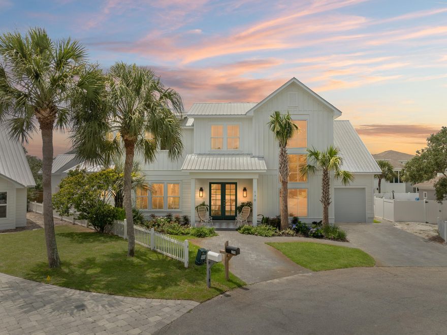 Welcome to The Palm Parlour! This vibrant and unique beach retreat is tucked away within the exclusive community of Sand Cliffs on the Gulf, located on the sought-after East end of 30A. This stunning home features 4 bedrooms + bunks and 4.5-bathrooms, plus bonus media room and library loft boasting across 3,993 sqft of living space. Stepping inside, you are greeted by the beautifully designed open-concept living space featuring a beautiful terrazzo tiled fireplace as the focal point of the room and bi-fold doors that create a seamless flow to your outdoor oasis. The dining area is a showstopper, drawing your eyes to the bold, de Gournay hand painted wallpaper mural complete with chic European style cafe seating. The vibrant design continues into the Chef's kitchen.. equipped with a mint green Lacanche 6 burner dual-fuel range, custom scalloped range hood, oversized rounded island, and gorgeous Calacatta viola marble counter tops in kitchen and pantry. The East wing is home to the primary suite featuring vaulted ceilings, spacious walk-in closet, and spa-like bathroom complete with Rose Cristallo quartzite counter tops and vintage murano glass light fixtures. On the primary level you will also find the laundry room, walk-in pantry, and a funky half-bath with direct access to your outdoor retreat. Step outside and enjoy the generous lanai with checkered tile inlay, sparkling pool surrounded by lush landscaping, and conversational gas fire pit. As you head up the stairs, you will be greeted by a stylish loft library with built-in shelving perfect for displaying art, books and family keepsakes. The second level is also complete with ample sleeping space for family and guests, with 3 additional bedrooms and 3 bathrooms, all with their own personalites. You'll also find thoughtfully designed bunks that add a functional touch. You will also find a moody bonus media room perfect for cozy movie nights in. The second level balcony and rooftop terrace provide relaxing spots for morning coffee or listening to the waves roll in! Residents of Sand Cliffs can enjoy private deeded beach access to the infamous 30A sugar-white sands and emerald waters. This one-of-a-kind home in Sand Cliffs offers the perfect blend of exclusivity, vibrancy, and relaxed beach living with no short-term rentals allowed, ensuring peace and privacy year-round. Don't miss this rare opportunity to own a slice of paradise in one of 30A's most desirable neighborhoods!