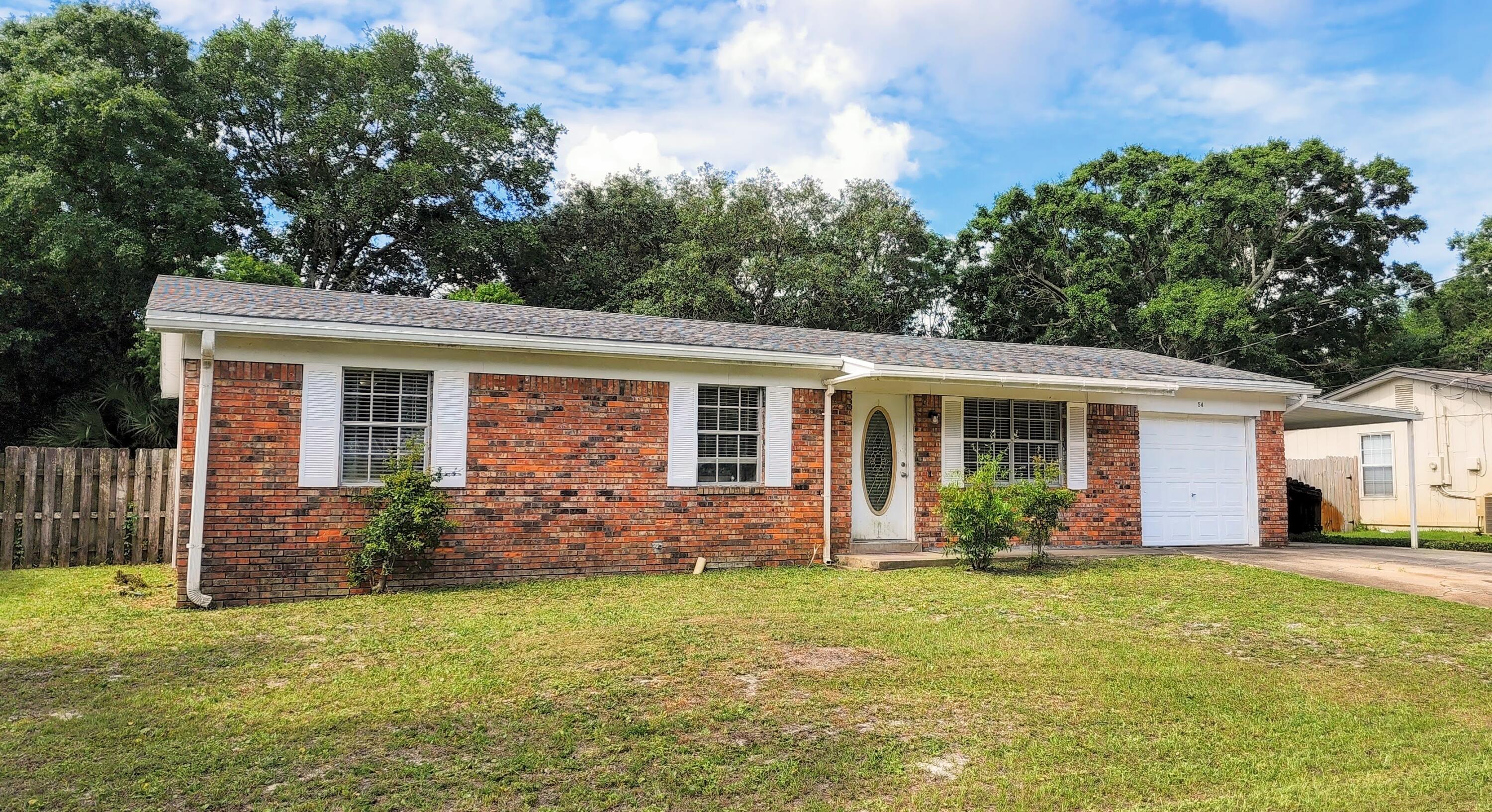 Priced to sell! Don't miss your chance to own this 3 bedroom/1.5 bath home with a garage, carport, shed, screened porch, and privacy fence. Just minutes to Hurlburt Field, shopping, and restaurants. This home has no HOA and flood insurance is not required. The owner has done many updates over the past 5 years: kitchen cabinets, counters, flooring, bathroom vanity, toilet, HVAC, water heater, and more. All it needs is a new buyer to complete the finishing touches. Currently rented through July 31 but an investor could purchase now and collect the rent through then. Schedule your showing today!