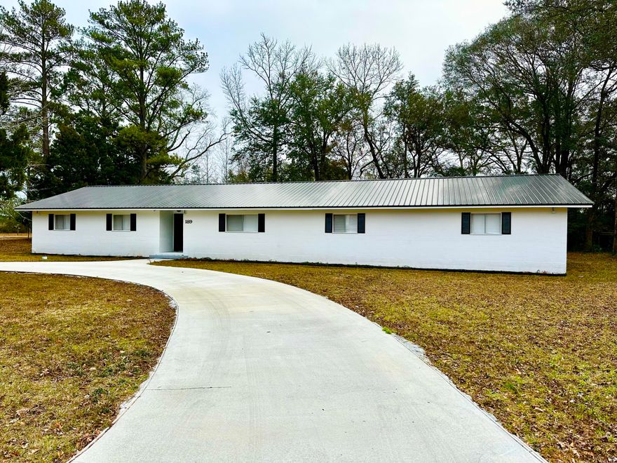 OPEN HOUSE February 18th 11am-1pmLooking for a 3 bedroom, 2 bath home on a large, tree lined corner lot?  You've found it.  This newly renovated home features recessed lighting, beautiful white cabinets, granite countertops and a gas stove.  You will love the new flooring and paint throughout and the two living areas make entertaining a breeze.  With the garage off the back of the home, you enter through the mudroom, which is complete with a utility sink and shower!  The new roof and new exterior paint compliment the home perfectly.  The circular drive offers abundant parking for family and friends.  Come see this beauty today!