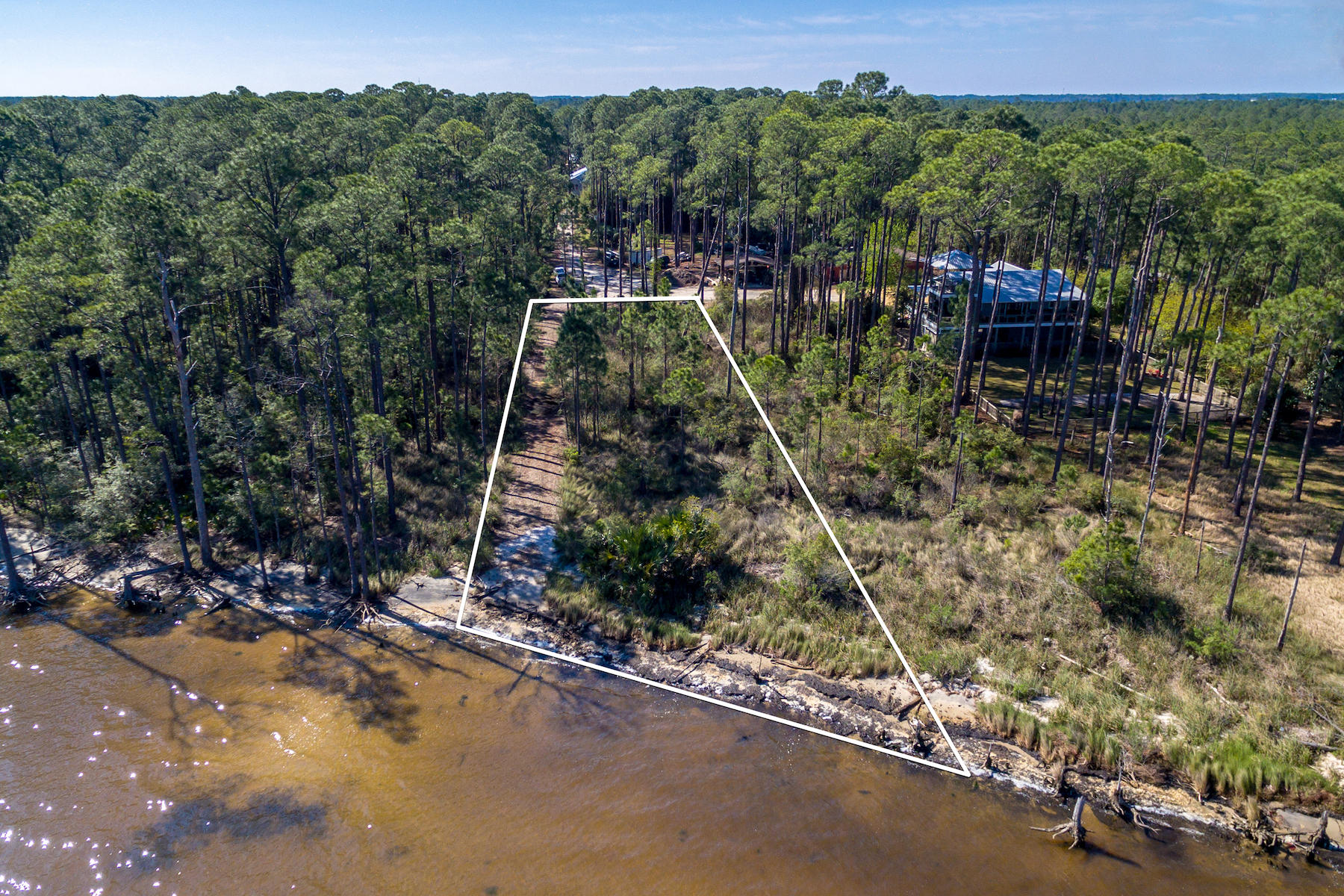 Have you dreamed of living on the water? Here is an amazing opportunity to own a piece of paradise directly on Choctawhatchee Bay. Imagine waking up to gentle breezes and the soothing sounds of inland waters and everything that bayfront living can provide. Call today for details on this fantastic serene and wooded half acre lot!