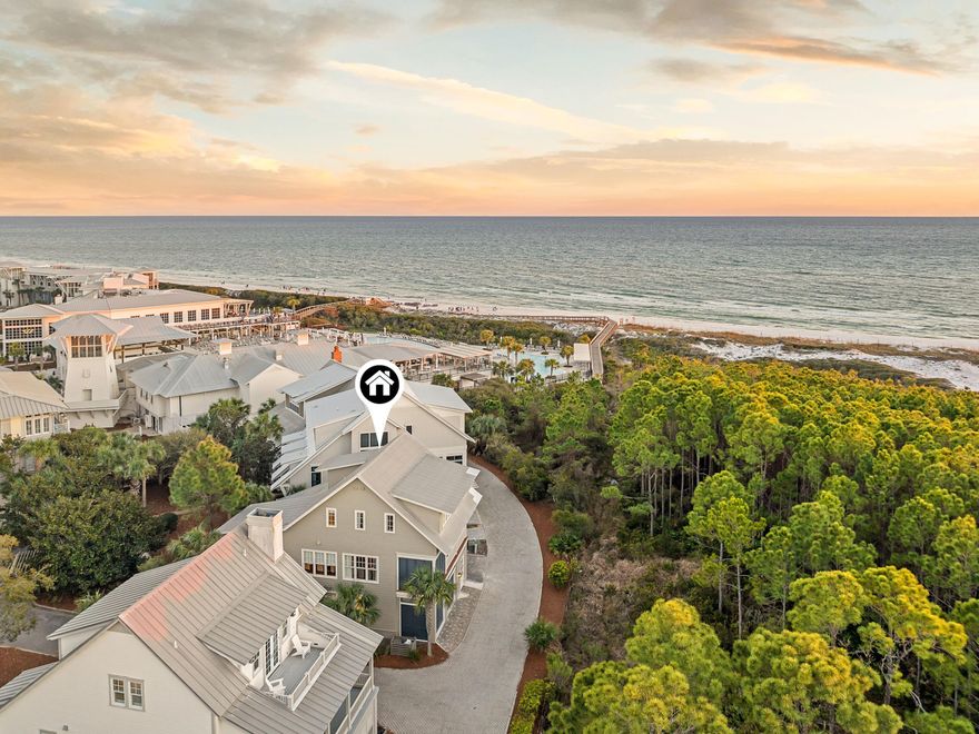 Situated just three lots from the Gulf on coveted Park Row in WaterColor, 105 Park Row Lane captures stunning Gulf views and offers unmatched access to the newly reimagined WaterColor Beach Club. Bordered by untouched national forest, this distinguished residence offers a rare combination of refined coastal living and tranquil natural surroundings. Thoughtfully refreshed with new paint, furnishings, and decor, the home is impeccably turn-key and ready to be enjoyed. With four spacious bedrooms and an additional sleeper sofa spread across three private levels, the home ensures a thoughtful layout that maximizes privacy and comfort for all. The second and third-floor balconies provide expansive Gulf views, where you can soak in the sights and sounds of the waves while enjoying the seclusion of the forested backdrop behind the property.

The heart of the home is the open-concept living space, flooded with natural light and featuring vaulted ceilings, custom millwork, and designer lighting. The chef's kitchen boasts marble countertops, high-end stainless-steel appliances, and an oversized island, seamlessly flowing into the elegant dining and living areas. The second-floor balcony extends the living space with a family-sized dining table and a cozy hanging bed, creating an inviting outdoor sanctuary.

Beyond its stunning interiors, this home's prime location just steps from the Beach Club makes it a rare investment opportunity with strong rental projections. Offering an unparalleled blend of luxury, privacy, and convenience, 105 Park Row Lane delivers the ultimate WaterColor lifestylethis one won't last long!