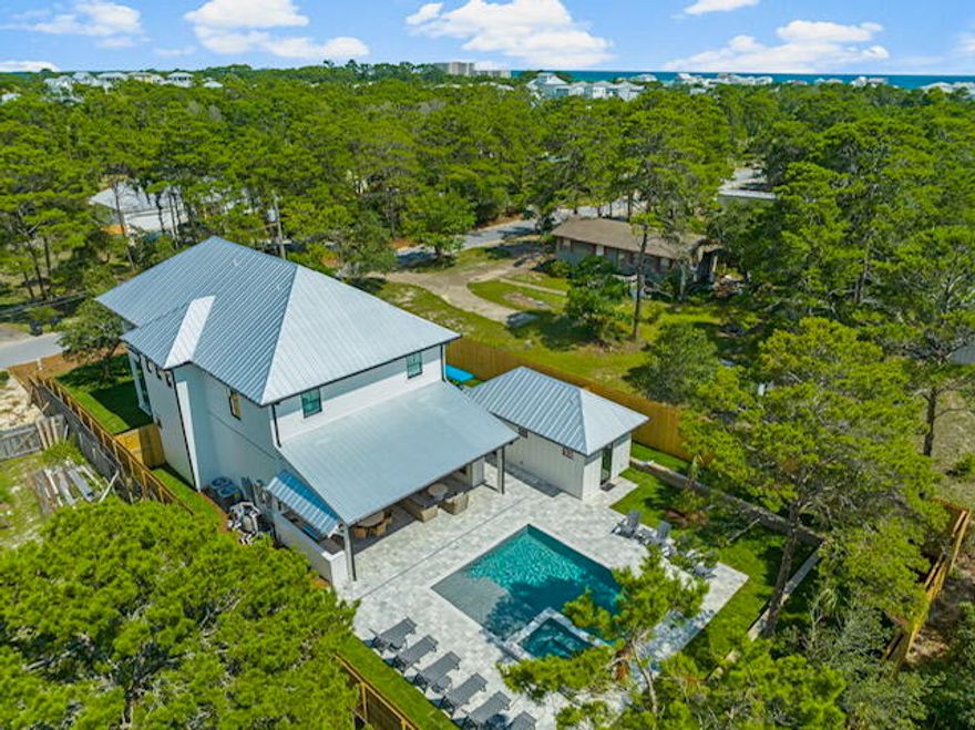 Ultra-Custom Inlet Beach Retreat5 Bedrooms | 5.5 Bathrooms | 3,000+ Sq Ft | Private Pool ; Hot Tub | Detached Garage;Full Bath | Fully Furnished | $200K+ Annual Income | No HOA | Prime LocationWelcome to your private sanctuary in Inlet Beach, where sophisticated design, resort-style living, and an unbeatable location combine to create the ultimate coastal retreat. Whether you're seeking a luxurious second home or a top-performing vacation rental, this residence delivers in every way.Designed with comfort, style, and durability in mind, every detail of this home reflectsthoughtful craftsmanship and timeless elegance. Interior Highlights:
* Spacious open-concept floorplan perfect for gathering and entertaining
* Large designer chef's kitchen with Taj Mahal quartzite, oversized island, walk-in pantry, stunning tile & design
* Custom millwork throughout every room, plus select antique doors for added charm
* Professionally styled premium furnishings (sold fully furnished!)
* Thoughtfully designed built-in bunk room ideal for kids or guests

Resort-Inspired Outdoor Living:
Step into your own private backyard oasis a resort-style saltwater pool with sundeck, oversized hot tub, and a fully equipped outdoor kitchen under a covered patio. The outdoor
gas fireplace, lush landscaping, and ample seating areas make it ideal for entertaining year-round.
* Detached garage with extra storage for golf carts, bikes, and beach gear
* Beautifully appointed outdoor pool bath for guest convenience
* Spacious paver driveway with lots of parking
* Covered front porch and rear patio perfect for multiple relaxing areas
* Surrounded by mature palms, live oaks, and a manicured lawn

Unmatched Prime Location Perfectly positioned in a peaceful, upscale enclave of Inlet Beach:
* Direct beach access (straight down the street) a short walk, bike, or golf cart ride away
* Adjacent to Camp Helen State Parkenjoy fishing, paddleboarding, canoeing, and
nature trails
* Moments from Rosemary Beach and all the shopping, dining, and energy of 30A
Enjoy the rare combination of peaceful privacy with vibrant beach town living!

Investment & Quality Highlights:
* $200K+ annual short-term rental income
* No HOA
* Built to high standards with low maintenance in mind
* Hurricane-impact windows & doors
* Energy-efficient spray foam insulation
* Structured wiring for modern tech
* Metal roof, Trex decking, and Hardie exterior for long-term durability
* Dual tankless water heaters & irrigation well system

Luxury, Location, and Long-Term ValueAll in One:
From its stunning design and top-tier finishes to its income potential and beachside location, this home is more than a propertyit's an opportunity.
Turnkey, high-performing, and unforgettable!! Don't miss out on this RARE GEM!
