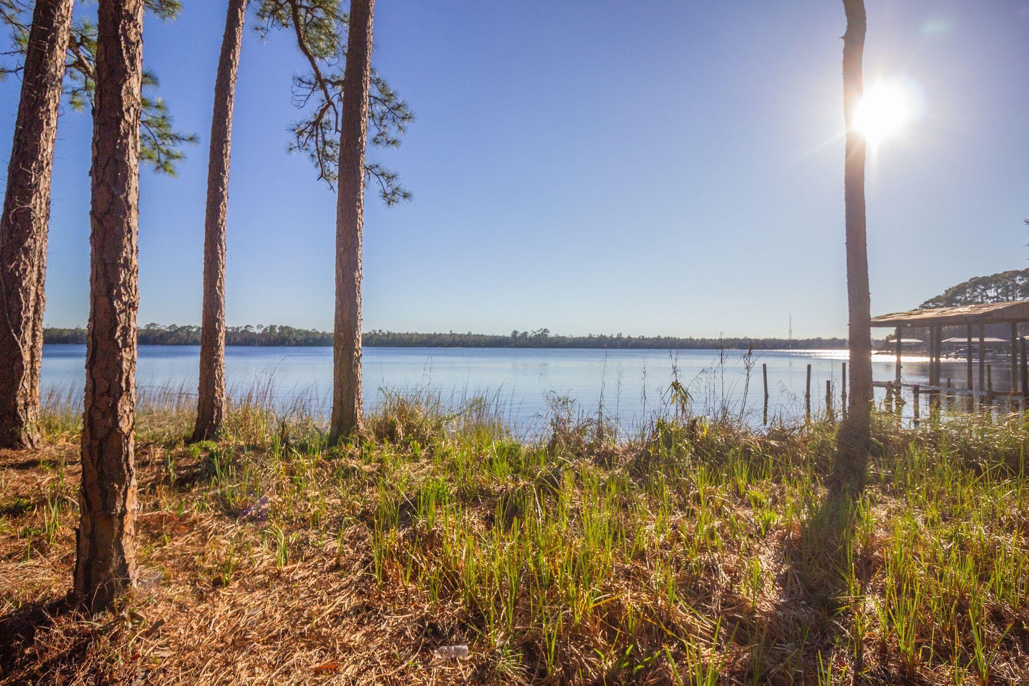 Property is being sold as land value only, no access will be given to the house. Beautifully treed waterfront lot with 1.39 acres on Rocky Bayou.