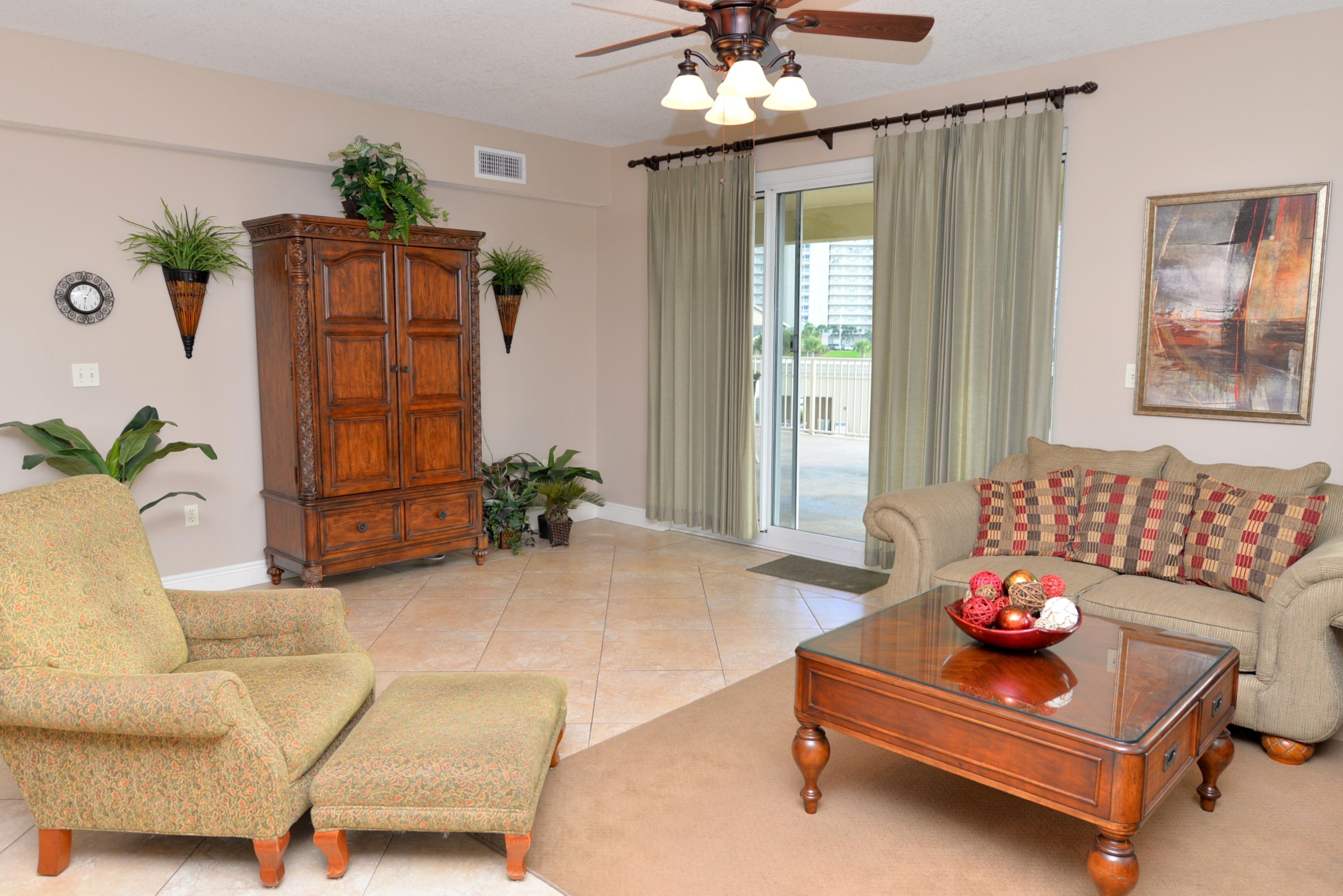 PRETTY MUCH PERFECT!! Have a taste of the good life in this immaculate three bedroom, three bath west end-unit in one of the newest condo complexes in the area. Featuring one of the largest balconies in the building, the unit allows you to watch your kids swim in the pool & walk down only one flight of stairs to go to the beach no need to wait for elevators! Floors are tiled throughout except for the bedrooms. The condo is furnished very tastefully in neutral colors with beige walls. There are also custom draperies. The kitchen has natural cabinets, granite counter tops & G.E. appliances. The spacious living area & the master bedroom both open to the big balcony. The master suite features a luxury bath & each of the other two bedrooms has its own private bath. There is a king