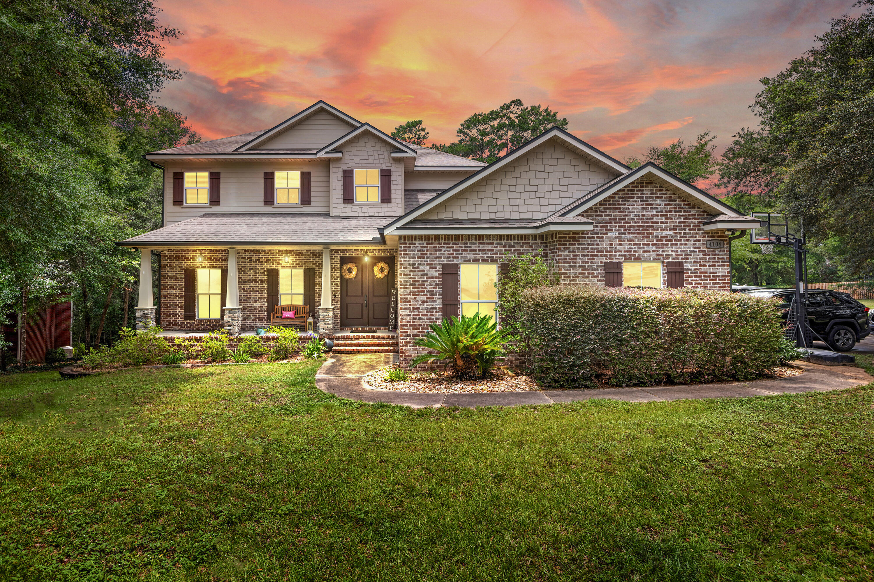 JUST LISTED in the golf community of Rocky Bayou Country Club Estates of Niceville - This stunning 2016 custom Pool home sits on a nearly 1/2 acre corner lot with 4 beds, 3.5 baths, an office, a spacious den, and a large 3-car garage. This exceptional residence offers over 3,400 sqft of beautifully designed space with high-end finishes throughout, beamed high ceilings, open concept living areas w/ gas fireplace, downstairs master suite, separate office, screened porch and so much more. The backyard is a true oasis with a saltwater pool & spa, gas fire pit, and custom pavered deck--perfect for relaxing or entertaining. Located just minutes from A+ schools, Eglin AFB, dining, entertainment and the most beautiful beaches in the world. Don't miss this rare find, schedule a private tour today!