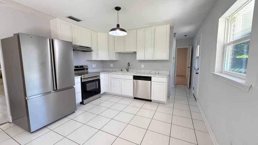 Beautifully updated 3BR/3BA home with approx. 1,700 sq ft in highly sought after Kenwood neighborhood. Features include two master suites with walk-in closets and updated baths, plus a brand-new eat-in kitchen with white shaker cabinets, farmhouse sink, and stainless steel appliances. Living and dining areas offer laminate/tile flooring, dual ceiling fans, and French doors (2021) to the backyard. Major updates include roof (2022), windows/doors (2021), HVAC (2018), sewer lines (2024), and insulation (2023). Additional highlights: laundry room, Ring doorbell, ADT wiring, fresh exterior improvements, and fenced yard. Centrally located near shopping, dining, schools, and bases--truly move-in ready!