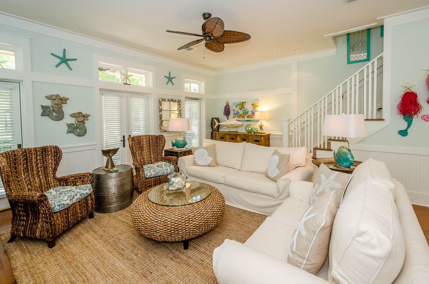 Beautifully remodeled park-front home in the Turtle Ridge Neighborhood of WaterColor. This home comes tastefully decorated and is move-in ready. There are three bedrooms and three bathrooms upstairs plus a bedroom with bunk beds and a full bathroom downstairs.The floor plan downstairs is open and the screened-in front porch overlooks Turtle Ridge Park for those quiet mornings or winding down in the afternoon. This is a must see for the person looking for privacy and value in WaterColor.