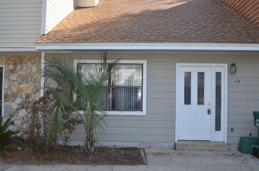 Roomy two story townhouse with large living room with cozy brick fireplace. Both bedrooms have full bath. Split bedrooms (first and second floor). Wooden deck off first floor bedroom and fenced back yard. Cat or very small dog only with non-ref pet fee.