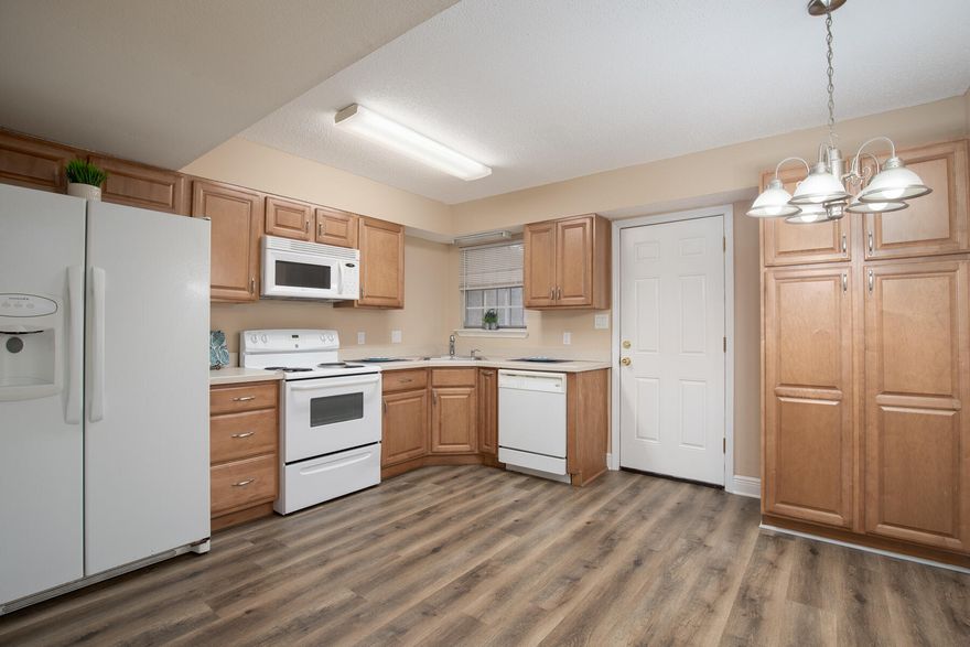 Two Story 2 Bedroom / 1.5 Bath Renovated Townhome Centrally located in Fort Walton Beach!  Features and Updates include:  2016 Dimensional Shingle Roof / 2021 Interior & Exterior Paint / All New Flooring ~ 2021 Carpeting & Vinyl Plank Flooring / 2012 AC & Heat / 2012 Hot Water Heater / 2016 Tub and Custom Tile Surround / Updated Kitchen Cabinets & Bathroom Vanities / Updated Ceiling Fans and Light Fixtures / 6 Panel Doors / Under Stair Storage Closet / Indoor Laundry Room / Privacy Fenced Yard / Covered Front and Back Porches / Outdoor Storage Area.  Conveniently Located Approx 5 Miles from Hurlburt Field, 6 Miles from Eglin AFB and Only 3 Miles to the Most Beautiful Beaches on the Emerald Coast and all the Fun this area has to Offer! Buyer to Verify all Dimensions and Information!