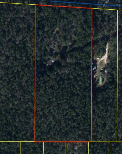 Super deal on this 8.3 Acre Parcel. SOLD (AS IS) WHERE IS--Price is Price8.3 Acres in Defuniak Springs - wooded with Older home, good bones but unsure condition.