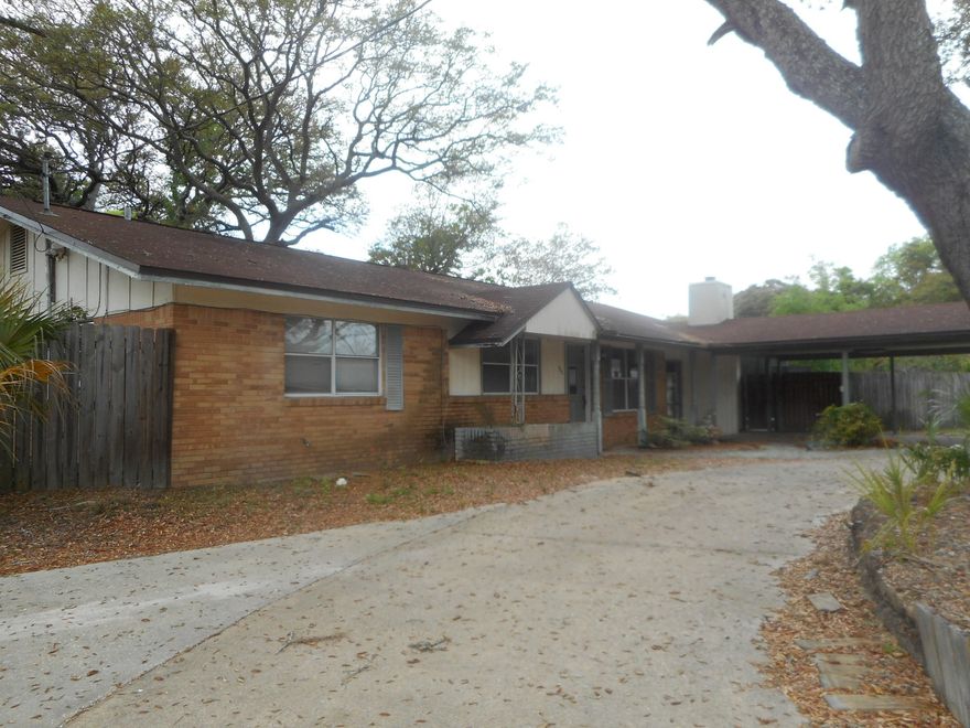 Great 3 BR home on corner lot. Screened in porch and in ground pool. Open kitchen and living area. Family room has been added with a fireplace. Nice private fenced back yard with additional storage shed.
